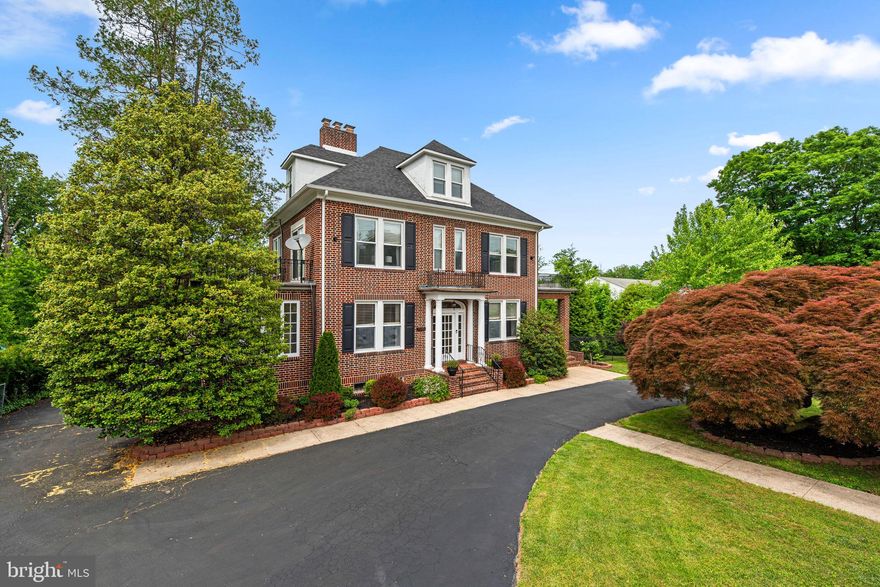 Timeless charm meets modern comfort in this stately all-brick Colonial nestled on a beautifully landscaped half-acre lot in the heart of Catonsville. This 5-bedroom, 4.5-bath home features over 3,800 square feet of finished living space, a circular driveway framed by mature plantings including a stunning Japanese maple, and a 3-car detached garage and an oversized driveway and parking area. Inside, you'll find original hardwood floors, tall ceilings, and classic details throughout with thoughtful renovations throughout. 

The living room offers a fireplace and French doors that open to a sunroom with panoramic windows—perfect for year-round enjoyment.The gourmet custom kitchen has a pantry, gas cooking and flows into a breakfast area and formal dining room along with a 1st floor office/den/bedroom with custom built-ins from 1925, while the fully finished lower level includes a spacious rec room, full bath, and loads of storage with a walkup to the yard and even an incinerator (yes, we can tell you the story!). Retreat upstairs to find soaring ceilings, generously sized bedrooms, including a primary suite with an updated bath with a soaking tub and dual sinks and sitting porch, newer flooring, and modern touches throughout, and a fully finished third level includes a laundry room, full bath with walk-in shower, and two bedrooms, including a walk-in closet. 

Enjoy dual-zone HVAC, updated electrical, updated water line to the house, and a combination of vintage and updated windows.

Outdoors, your private oasis awaits! Trex decking, covered porches, a 51,000 gallon pool with a diving board area that's 14-15 feet deep, newer pump, and it's surrounded by a fenced yard, a huge patio and pergola area and lush landscaping. 

The oversized three-car garage includes a second-story storage area, a finished rec room/office with a separate entrance on the ground level, and plumbing roughing and walls built to easily add a full bath. 

Meticulously maintained and move-in ready, this home is a rare blend of historic elegance and everyday functionality—ideal for entertaining, relaxing, or simply enjoying the beauty of the neighborhood. Don’t miss it! 

No HOA! Roof '23! Hot Water Heater '22! One of the AC units' '24! Sealcoated Driveway '25!