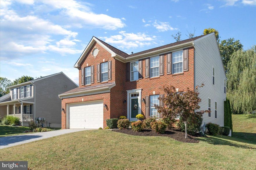 BEAUTIFUL  4 Bedroom 3 FULL and 1 HALF Bath BRICK Front Colonial in White Marsh * Features Include: GORGEOUS eat in kitchen with GRANITE countertops and stainless steel appliances * SPACIOUS sun filled  family room with a floor to ceiling STONE front gas fireplace * GLEAMING hardwood floors * MAIN level laundry * LARGE primary suite with FULL bath and walk in closet * THREE additional bedrooms and a FULL bath complete the UPPER level * On the LOWER level you will find a HUGE rec room which include built-in surround sound system, and GAME room complete with a FULL bath *  The dishwasher, washer / dryer, and roof are all new in 2021 *Maintenance free deck * TWO car garage and MULTIPLE car driveway * IMPECCABLE home that will not last long * A MUST SEE!!