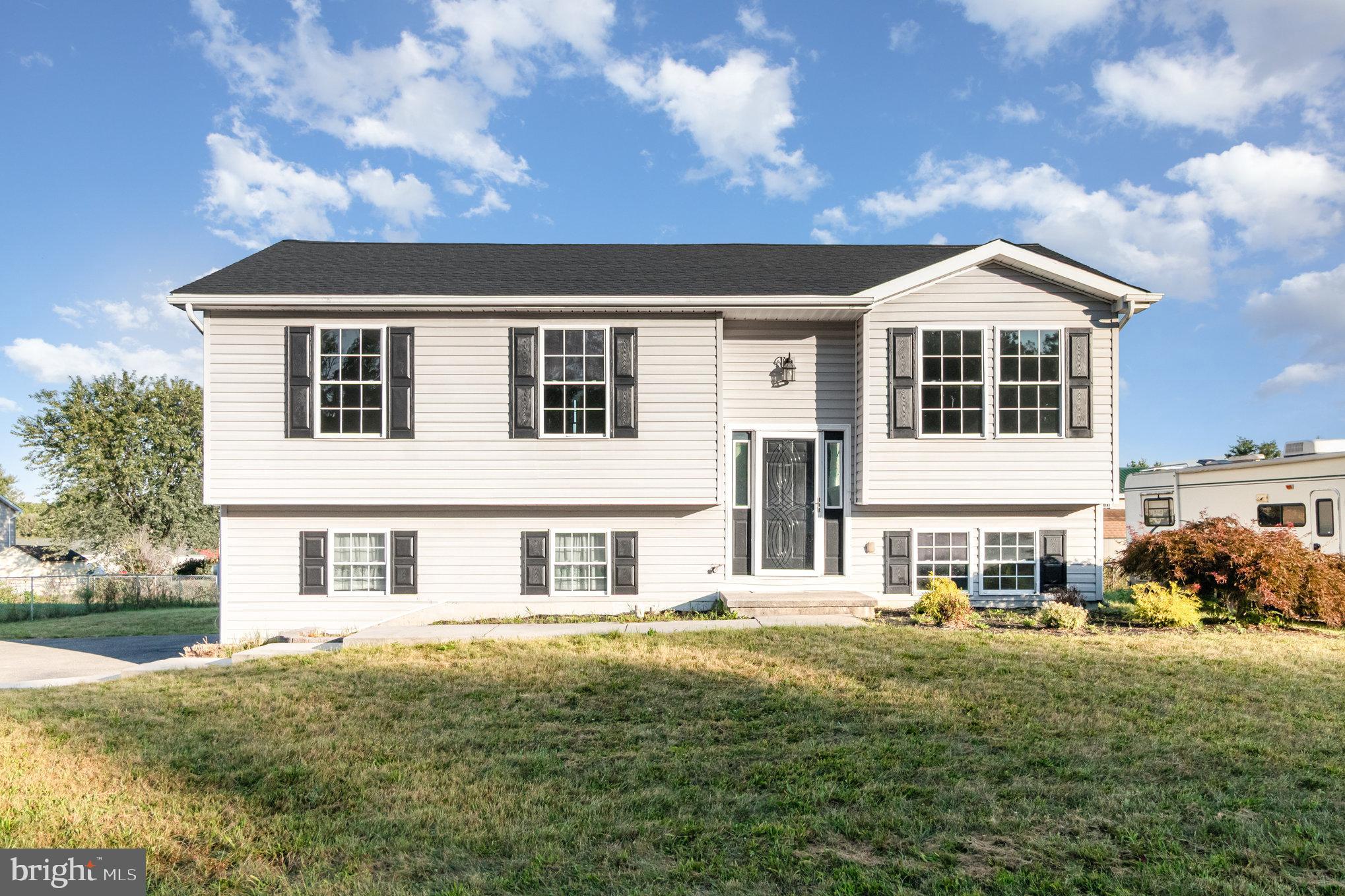 Welcome to 341 Cortland Circle, a beautifully updated bi-level home in the desirable Apple Hill Estates community in Southampton Township. This home offers modern upgrades, functional living space, and a brand-new roof and updated deck—providing peace of mind and outdoor enjoyment for years to come.
Built in 2006 and thoughtfully renovated in 2024, this 3-bedroom, 2-bathroom home features a light-filled open layout with fresh neutral paint, new carpeting in the bedrooms, and durable, low-maintenance flooring in the living and dining areas. The spacious living room flows directly into the updated kitchen, complete with stainless steel appliances, solid-surface countertops, and freshly painted cabinetry.
Step outside from the dining area onto the rear deck, ideal for hosting summer barbecues or enjoying your morning coffee overlooking the private backyard. The deck connects to a yard with mature trees and plenty of space for gardening, play, or pets.
The primary bedroom offers ample natural light and closet space, with easy access to the full hallway bathroom featuring an updated vanity, modern fixtures, and a clean, stylish design. Two additional bedrooms on the main level provide flexibility for family, guests, or a home office.
Downstairs, the fully finished lower level offers a large bonus room that can serve as a family room, rec room, home gym, or media space.
Situated on a 0.27-acre lot, this home offers peaceful suburban living with easy access to Route 11 and I-81, making commuting to Shippensburg, Chambersburg, or Carlisle a breeze. Located in the Shippensburg Area School District, and just minutes from Shippensburg University, shopping centers, parks, and local restaurants.
Whether you're looking for your first home or your next home, 341 Cortland Circle checks all the boxes. Schedule your showing today!