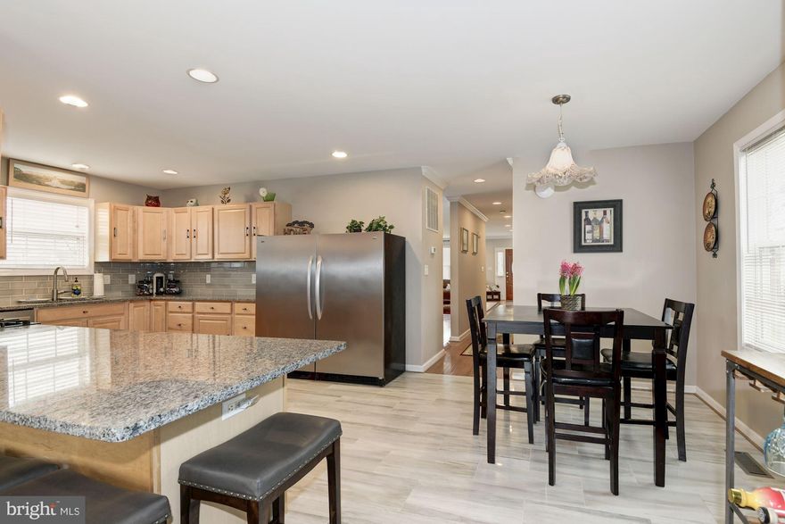 Spacious, immaculate and move-in ready! Almost 4000 finished square feet on 3 levels, with two master suites, recessed lighting, crown molding, open floor plan, commercial refrigerator and freezer, 2 family rooms, kitchenette on lower level, amazing storage space, and all on a cul-de-sac convenient to Old Town, the Beltway, shops, metro, restaurants, etc. Groveton Heights Park at end of street.