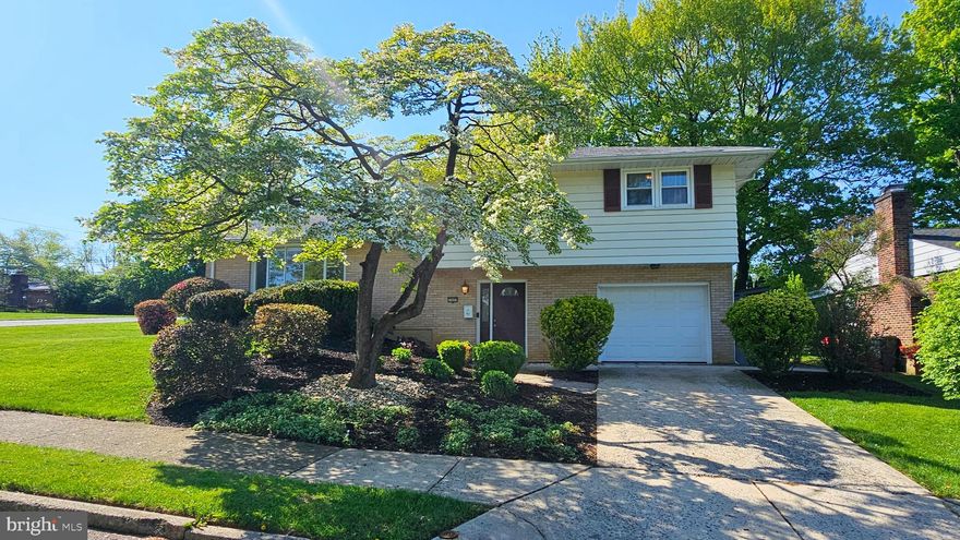 Enjoy the best of classic suburban living in Bethlehem’s desirable Rosemont Manor neighborhood. This well-appointed split-level home offers 3 bedrooms, 2 full and 1 half baths, with a layout designed for both everyday comfort and easy entertaining. The open-concept living and dining area is filled with natural light and highlighted by gleaming hardwood floors, creating a warm and inviting atmosphere. The clean, spacious kitchen offers ample room for meal prep and storage, ready to accommodate your culinary needs. Just steps down, the lower-level family room provides a cozy retreat, while a bonus rear room—surrounded by wraparound windows—brings the outdoors in and offers direct access to the rear patio, perfect for relaxing or hosting guests. The finished basement adds even more versatility, featuring a laundry room with utility sink and an additional living area ideal for a media room, home office, or casual hangout space. Outside, enjoy low-maintenance landscaping accented by mature trees that create a serene canopy over the expansive backyard. A one-car garage offers space for a small SUV along with additional storage. Tucked away on a quiet street, yet conveniently located with easy access to shopping, dining, and major routes, this home offers the perfect blend of tranquility and accessibility.