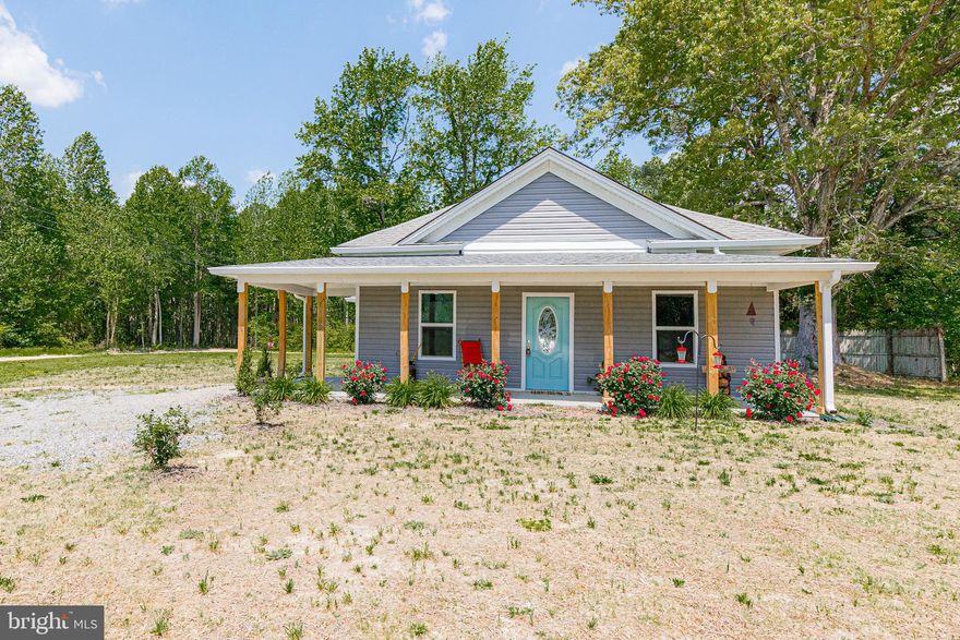 Welcome to your dream retreat! This beautiful renovated 3-bedroom, 1-bath cottage, offers the perfect mix of custom craftsmanship and modern style. From the brand-new vinyl siding and inviting front porch to the bright, airy floor plan, every detail shines. The heart of the home is a gorgeous custom kitchen featuring live-edge black walnut countertops—an eye-catching space that’s as functional as it is beautiful. The spacious primary bedroom offers a large walk-in closet with custom shelving, while two additional bedrooms provide plenty of space and flexibility. The fully updated bathroom boasts sleek new fixtures and vanity. Throughout the house, stylish and durable wood stamped concrete floors provide durability and easy maintenance. Step outside to your private backyard oasis, complete with a brand-new patio and firepit—perfect for cozy evenings under the stars, or gathering with friends and family! Sitting on 1 acre, this home offers both serenity and convenience—just 10 minutes from town and local amenities. With blown-in attic insulation for energy efficiency and thoughtful upgrades throughout, this unique property is ready to welcome you home. Don’t miss your chance to own this one-of-a-kind gem—schedule your private tour today!