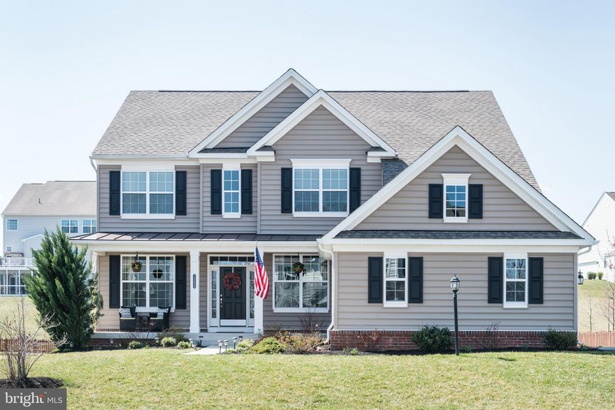 Stunning and impeccably-maintained 5 bedroom/3.5 bathroom single family home in the amenity-rich neighborhood of Village Green in Leesburg VA. Situated in wine country near the charming Village of Lucketts, this beautiful home offers 4,090 SF on 3 finished levels. The main level boasts a sun-filled 2 story high living room with a custom trimmed gas fireplace and feature wall serving as the focal point. The heart of the home is the gourmet kitchen with large island, SS appliances, granite counter-tops, glass tile backsplash, double oven, and oversized pantry. The main level continues on with a 2 story foyer which opens up to the formal dining room, sitting room, office/den, and laundry room with a granite counter, sink, and custom mudroom built-ins. The gorgeous main floor is complete with details such as eye-catching light fixtures and trim/molding throughout. The second floor includes a spacious master suite with 2 separate walk-in closets with custom built-ins, soaking tub, glass shower enclosure, 2 adjacent vanity areas, and private toilet room. In addition, the second floor includes 3 more bedrooms and a full bath. The finished basement includes an enormous rec room, in-law suite, large unfinished storage room, and walk-out to patio. Located on a large 1/3 acre flat lot, this home features a sprawling custom stone patio with direct access to the kitchen, built-in fire pit area, and seating wall with lighting. Landscaped to perfection, complete with a blooming butterfly garden in season. Oversized attached 2 car garage with large driveway for plenty of parking. The location gives both country charm and the convenience of Leesburg while also being close to nearby wineries, breweries, restaurants, and antique shopping! Access to great schools within a friendly community, this property is in immaculate condition, and priced to move quickly!