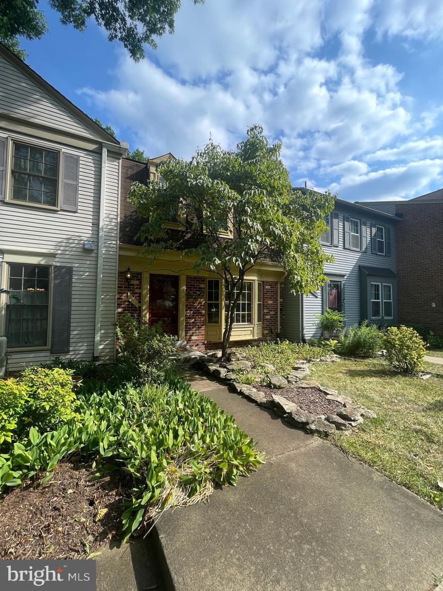 Backs to Common Area and Trees / Window Seat with Bay Window / Hardwood Floors on the Main and Lower Levels / Hardwood Stairs / Brick Wall with Wood Fireplace / Utility Room with Workshop / Large Storage Area in Lower Level Utility Room / Every Level has a Bathroom / Storm Windows / Access to Reston's incredible amenities (including pools, trails, tennis courts, and community centers) / Located just minutes from Reston Town Center, major commuter routes, and the Silver Line Metro, this home offers the perfect blend of tranquility and convenience.