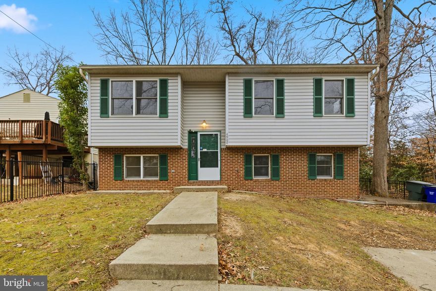Fantastic location within walking distance to the Greenbelt Metro, with quick access to I-495 and I-95. Enjoy the convenience of walking to nearby parks, shopping plazas, and restaurants. Located in a quiet, desirable neighborhood with a park just one block away.

Built in 1989, this home is bright, airy, and well maintained. The living room features hardwood flooring. and the spacious kitchen offers plenty of room for a family dining table  with a newly installed vinyl plank flooring. The main floor complemented by hardwood floors throughout the living and bedroom areas.

Upstairs offers three generously sized bedrooms, including a primary bedroom with a private half bath. A tiled balcony overlooks a large, fenced backyard—perfect for relaxing or entertaining.

The finished basement includes a large family room with full-size windows, bringing in abundant natural light, as well as a sun-filled basement bedroom. This home combines comfort, space, and an unbeatable location for everyday living.