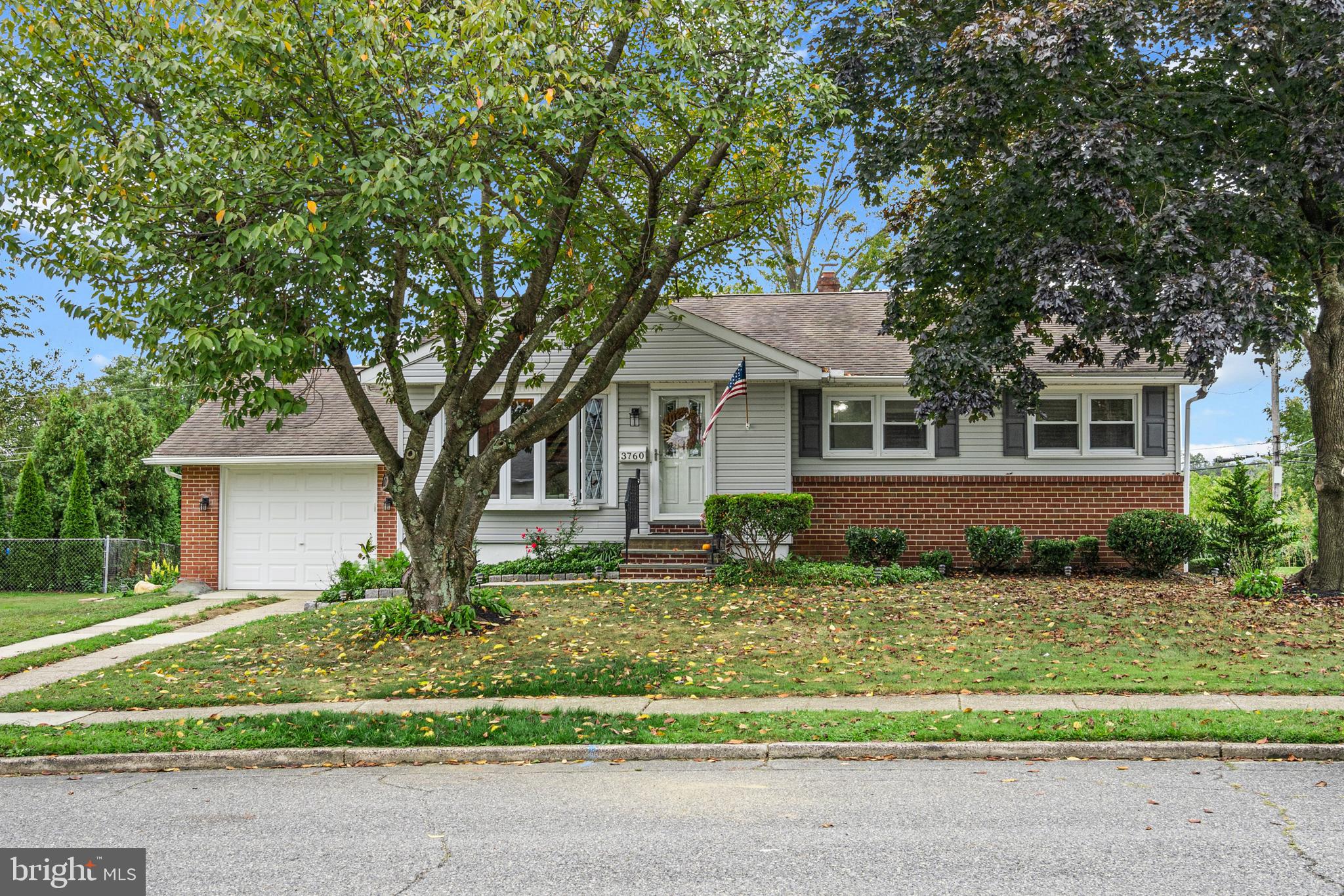 This solid Brookhaven Rancher offers single story living with all three bedrooms and a full bathroom on the main level! Upon entering the front door you can enjoy the family room and dining room, a large open space great for relaxing and enjoying the morning sun through the large bay windows. The original hardwood floors were brought back to life and add a touch of quality throughout the house. Past the dining area and into the kitchen is a clean canvas for personal touches. A cute backsplash adds a retro vibe to the kitchen but through the sliding glass doors is the best part of the house. The sunroom is where you will spend most of your time with coffee or cocktails this room is the best nearly year round! Downstairs is partially finished with a comfy living room great for movie nights with the fam. Laundry, a work bench and utility area are also downstairs. With a spacious one car garage and beautifully manicured yard that boasts beautiful flowers and roses all year round this home will not disappoint! Not to to be overlooked is the brand new sewer line with lifetime warranty! Seller is also offering a home warranty good for a year!!  * More photos coming tomorrow*
