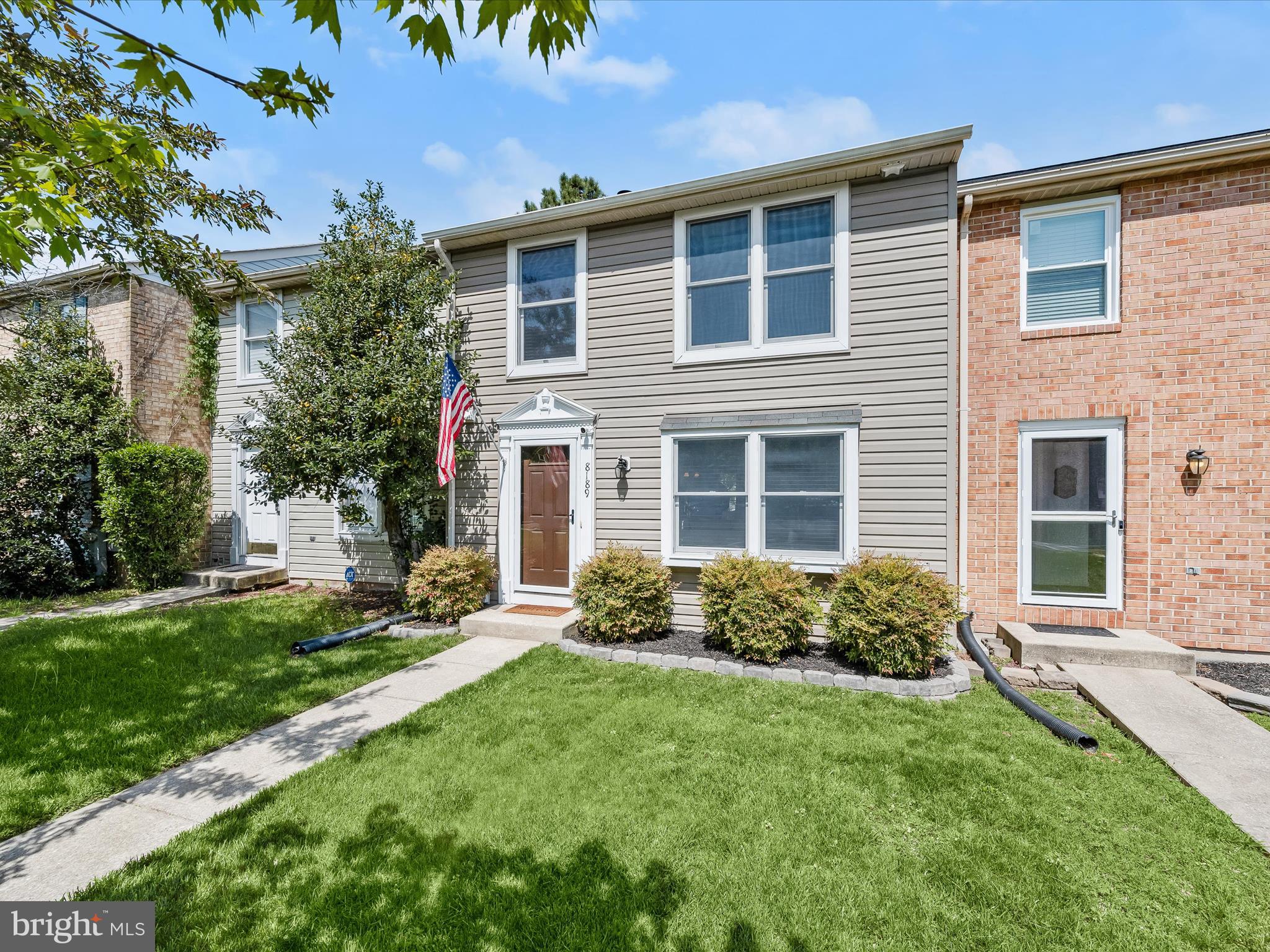 Set in a well-connected Pasadena community, this updated three-level townhouse offers space, style, and functionality in equal measure. A well-landscaped front welcomes you home, while inside, neutral paint and hardwood flooring set a warm and modern tone. The main level begins in a generously sized living room that invites conversation and relaxation, flowing easily into the open-concept dining area and kitchen. Natural light pours in through a sliding glass door, leading to a fenced backyard complete with a stone patio, beautiful landscaping with colorful blooms, and a storage shed, ideal for summer barbecues or quiet evenings outside. The kitchen is thoughtfully appointed with granite countertops, a pantry, and sleek, recently replaced stainless steel appliances including a refrigerator, microwave, and range. Whether you're prepping weeknight meals or hosting weekend guests, this space is designed to perform. A conveniently located powder room completes the main level. Upstairs, find three comfortable bedrooms, including a spacious primary retreat. A walk-in closet provides ample storage, while a cozy nook offers the perfect place for a desk, reading chair, or vanity. The full bathroom, accessible directly from the primary bedroom and the hallway, adds both privacy and practicality. Downstairs, the lower level expands your living space with a family room featuring a fireplace, ideal for movie nights or gatherings. A full bathroom, utility room, and laundry area with built-in shelving complete this well-designed level, offering versatility for guests, hobbies, or everyday living. Commuters will appreciate quick access to I-97, MD-100, and MD-2 for smooth travel to Annapolis, Baltimore, and beyond. With thoughtful updates, inviting outdoor spaces, and a prime location, this home is ready to welcome you.