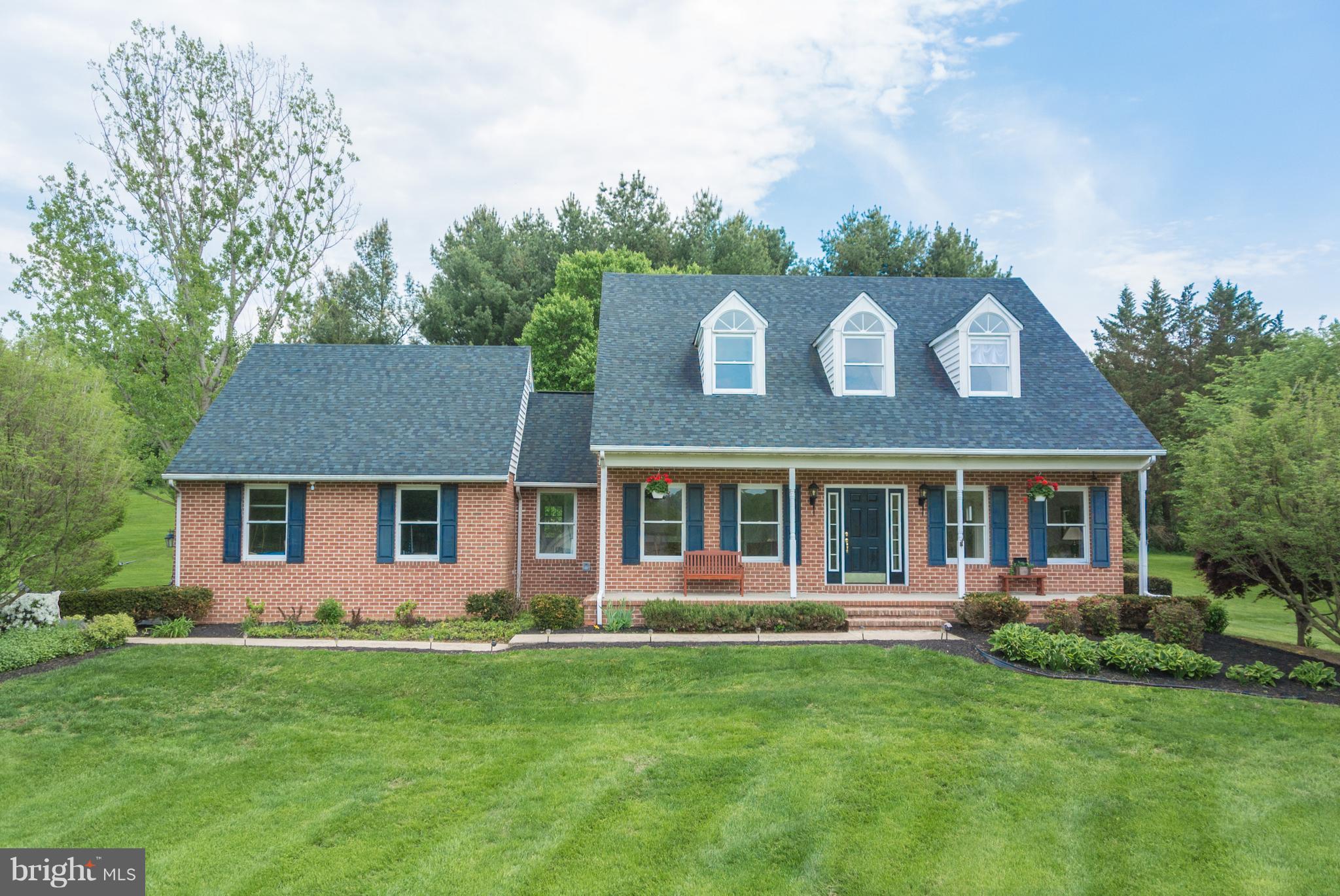 Spacious 5 bdrm Cape Cod situated on 2.6 ac on quiet cul de sac. Features incl: vaulted ceiling in both Mstr Bedroom w/large walk-in closet & main level Fam Rm. 3 car gar & private patio. Fabulous kitchen w/cherry cabs, walk-in pantry, granite counters, large island w/breakfast bar as well as table space. Finished LL w/Rec Rm, Den, Full Bath & Bdrm. Great for entertaining! Kohler generator a plus!