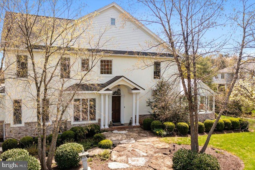 Nestled in picturesque Saucon Valley, this magnificent 5500sf residence embodies luxury living and is the epitome of timeless elegance. Lush landscaping, verdant lawn and long-distance views envelop the property, providing both privacy and tranquility. Exceptional architectural and design elements like high ceilings, rich random-width pine floors, incredible detail moldings, high-end finishes, and an abundance of windows all combine to create an oasis of sophisticated living. The flow is superb. The greeting and dining room with 10-foot ceiling, Brunschwig & Fils wallpaper and marble surround FP is ornamented with formal molding and custom window treatments. The Federal ambiance continues into the library, the perfect spot for pensive solace. With a nod to Nappa Valley, the living room is stunning with its 18-foot vaulted ceiling, trussed beams and curved corbels. The white oak paneling and cut-stone gas fireplace exudes warmth. Acoustically designed and defined by stone walls, the music room has a 13-foot coffered ceiling. The open kitchen is designed for efficiency and functionality. Cooking options are numerous with a S/S Gaggenau steam/convection oven and S/S TM10 Intelligent double ovens with refrigeration to keep your delectable dish chilled until the timer turns on the cooking. The 48” Wolf gas cook top has infrared grill, pot filler, 1600 cfm hood, and Dacor warming drawer. The cappuccino center has its perks, as do the Fisher Paykel 2-drawer D/W and undercounter Sub-Zero refrig/freezer drawers. Detailed wood cabinetry offers an astounding array of storage. Another highlight is the 2-story English style mahogany conservatory with UV protection glass panels. This structure includes the breakfast room with garden views, and the indoor courtyard. Dramatic turned staircase leads upstairs and down or take the elevator which services all three levels. The second floor offers a large landing with coffee station-wet bar, laundry room, and three distinctly private en suite bedrooms, each with WIC. The primary bedroom is stylish with tray ceiling, crown molding, chandelier, faux painted walls, and dressing room with large WIC. The bathroom is fully renovated and a testament to luxury with hand-painted walls and chandelier. Luxuriate under double rain shower heads and hand-held sprayers in the large glass shower or enjoy an indulgent soak in the serene slipper tub. Double vanity, beautiful tile work, separate water closet and another WIC are added features. The two guest suites offer similar elegance, and the bathrooms have glass showers and heated ceramic tile floors. Descend to the lower level, with floors of brick tile, to enjoy entertainment and fitness. The spacious family room with coffered tray ceiling is ideal as media room and through double pocket doors is the large wet bar with granite counter, double sink, two U-Line beverage cooler drawers and bar refrigerator. For the active lifestyle, the exercise room with cork floor looks through to the courtyard with stone walls and brick gas fireplace, and heated hydrotherapy saline pool, ideal for low-impact exercise and rejuvenation. This lower level offers flexibility for multi-generational living and aging in place, with a fourth bedroom and separate entrance via heated brick stairs. There is a large full bath with sauna shower and heated floor. The garage has excellent storage, pet wash station and car lift, adding a third parking spot. Fine dining and shopping are nearby, as are the Lehigh U. athletic fields offering opportunities for recreation. Explore close by Water Street Park, which hosts a farmer's market during summer and connects to the Saucon Rail Trail. Saucon Valley CC is 3 miles away. Experience maintenance-free luxury living where elegance, comfort, and convenience converge…and make this exquisite property your own!