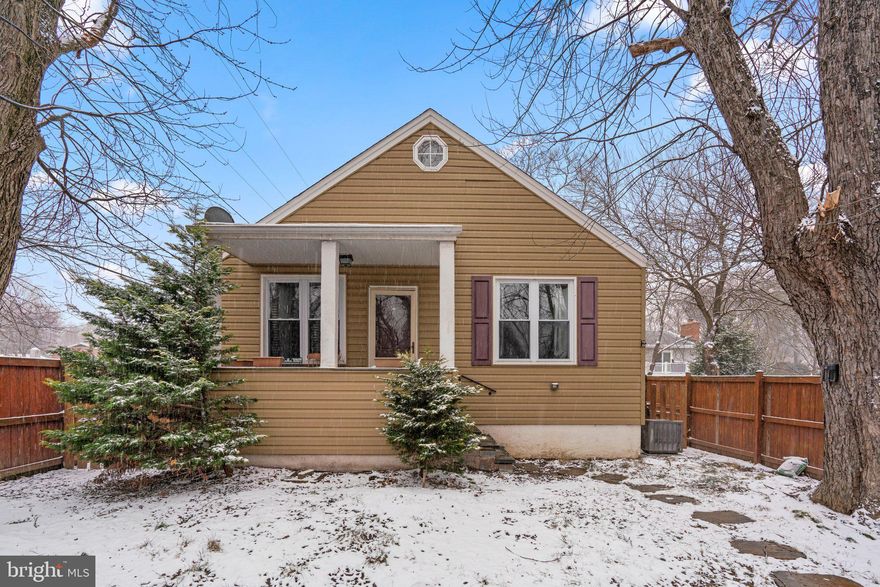 This charming home has been remodeled throughout and is larger than it appears with over 1,900 total s.f. on three levels.  Located in the Alberta Heights neighborhood of Severn, just a short walk to the popular Queenstown Park, there are no HOA restrictions in the community.  And, you're just 15 minutes from Fort Meade with quick access to Routes 100 & 97 for an easy commute to Baltimore, Annapolis, or DC.  A cozy, covered front porch welcomes you to the main level with luxury vinyl plank flooring throughout and recessed lighting in the main living areas including a living room, separate dining area, and a beautifully remodeled kitchen with 42” cabinetry, granite countertops and stainless appliances. Two bedrooms - including a primary suite with dual closets and private bath - and an additional fully remodeled bath with ceramic tile floors complete the main level.  The finished basement offers a family room with bar, a spacious third bedroom, a full bathroom, and a laundry/storage room.  The attic has been finished as a large bonus room that is perfect for a den/office or fourth bedroom.  The super-sized, privacy-fenced back yard is accessed from the kitchen and features a paver patio and storage shed. If you need some extra parking space, the gravel driveway has plenty of room for 4 cars and has a convenient turnaround area with no HOA parking restrictions.