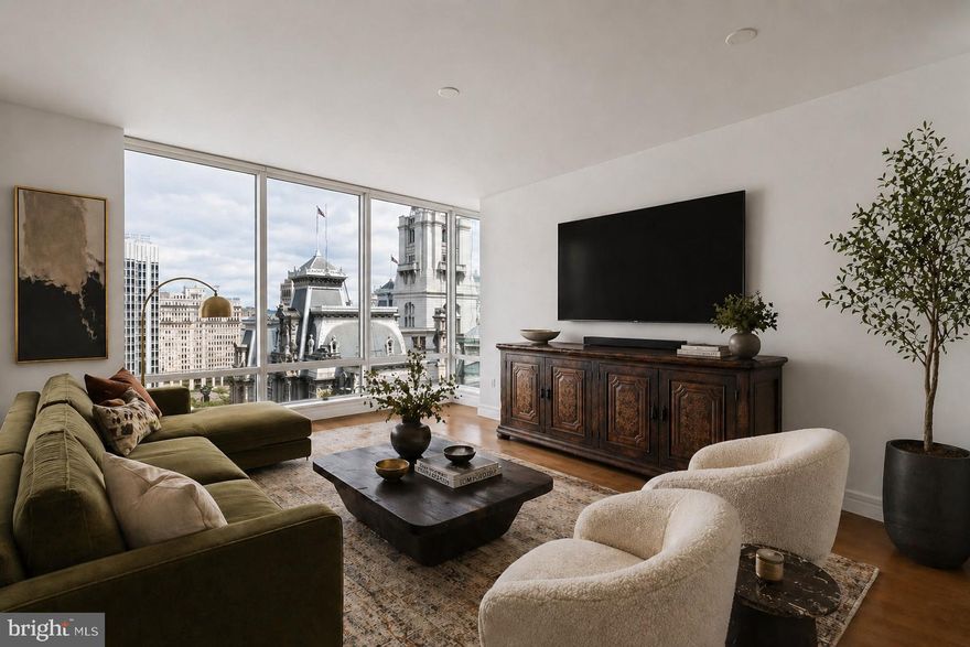 Enjoy stunning views of City Hall from this spacious one bedroom, one and a half bath residence at the Residences at the Ritz Carlton. The living and dining areas feature soaring ceiling heights, gleaming hardwood floors, and walls of windows featuring gorgeous views of Dilworth Plaza and historic City Hall. The chef's kitchen showcases VIKING, MIELE, and SUBZERO appliances, granite counters, and a convenient breakfast bar. The master suite boasts custom closets and an en-suite marble bath featuring a double vanity, glass enclosed shower, and soaking tub. Sleek motorized shades and inunit washer and dryer complete this elegant and impeccably maintained residence. Association fees include a 24hour concierge, chauffeured car service, state-of-the-art fitness center, pool with hot tub, and residents' lounge with outdoor terrace. Perfectly situated in the Rittenhouse and Avenue of the Arts area, this pet-friendly residence is steps away from fine dining, one of a kind shopping, world-renowned cultural destinations, and exciting nightlife. - Rent includes INTO Association fees.