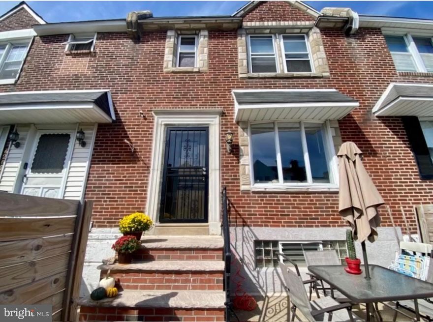 Welcome to this beautifully cared-for townhouse featuring 3 bedrooms and 2 full bathrooms, ideally located in the desirable Mayfair section of Philadelphia.

The exterior boasts great curb appeal with a private front yard enclosed by a 5-foot wooden fence and a charming wrought iron storm door leading up from the concrete and brick steps.

Step inside to a bright and inviting living room highlighted by a large bow window that fills the space with natural light. The recently renovated kitchen features new cabinets, granite countertops, a gas stove, new refrigerator, and a dishwasher, complemented by recessed lighting for a warm, modern feel.

Hardwood flooring flows throughout the main living areas and continues up to the second floor, where you’ll find three comfortable bedrooms. The basement offers a bonus room, complete with a full bathroom and laundry area, providing additional living or recreation space. From the basement, walk out to the rear parking area conveniently located behind the home.

This home truly combines style, comfort, and functionality — move-in ready and waiting for its next owner to enjoy!