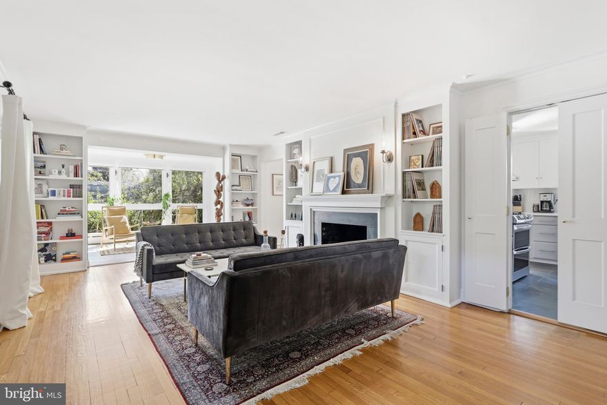 Welcome to 155 Rex, a charming single-family 3 bedroom, 2.5 bath home at the top of Chestnut Hill, one of Philadelphia’s most beautiful, beloved and walkable neighborhoods. This move-in-ready hidden gem offers the perfect blend of timeless character, modern updates, and unbeatable convenience. Upon entry, you will find a spacious living room centered around a handsome gas fireplace with extensive built-in shelving that adds warmth and architectural character throughout the space. Just beyond, a sun-filled sitting room and office area provides the perfect retreat for working or relaxing, with direct access to the lovely terrace. Adjacent to the living room, the formal dining room flows seamlessly into the updated kitchen, featuring stainless steel appliances, quartz countertops, and slate flooring. An additional suite on the main level offers exceptional versatility. Complete with a full bath, skylight, closet, and its own entrance to the rear yard, this space can function beautifully as a family room, playroom, breakfast room, guest suite, or convenient first-floor bedroom. Up the gracefully curved staircase, the second floor offers three light-filled, generously sized bedrooms. The sunny hall bath is tastefully appointed with onyx tile throughout.  A partially finished basement currently serves as laundry and storage space and includes a water closet, while also offering potential for future living space. Outside, the property truly shines. The fully fenced, expansive patio and entertaining areas include a built-in grill and plenty of room for dining, gathering, and relaxing amid the garden where you will find herb and vegetable beds, a grapevine, fig trees, and rose bushes. A charming garden shed provides additional storage, while two-car covered parking adds everyday convenience. Meticulous maintenance includes: flat roof reseal 5/26, slate roof maintenance 5/26, AC tuneup 5/26. Ask for our pre-listing inspection. Location is everything! Enjoy an easy eight-minute walk to Wissahickon Valley Park and its miles of scenic trails, along with convenient access to commuter rail and major highways for an effortless commute. Just two blocks from Germantown Avenue’s excellent mix of local shops, restaurants, and community favorites - from McNally's Tavern to Killian’s Hardware and Weavers Way Co-op - this home perfectly captures the small-town charm that makes Chestnut Hill so special.
