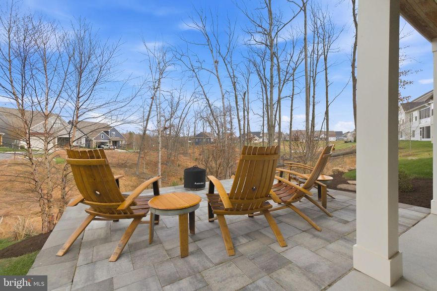 Built in 2021, this Shea Engage model gets a lot right from the start: a coveted 3-car garage, wider lot, wooded views, and thoughtful upgrades that make everyday living easier.<br><br>
Inside, the first impression is all about space and light. The foyer opens with tall ceilings, wide-plank engineered hardwoods, and a layout that feels open without feeling exposed. With 2,618 finished square feet on the main level, there is plenty of room to spread out while still keeping everything convenient.<br><br>
The kitchen is where everyone naturally ends up. Quartz counters, two oversized islands, a gas cooktop, wall oven, abundant cabinetry, and a beautiful upgraded hood that is no longer offered give the space a custom feel without sacrificing function. It flows directly into the dining area and great room, making the main living space feel connected and easy to enjoy.<br><br>
The main level also includes a well-sized laundry room and a primary suite positioned to take advantage of the wooded setting out back.<br>
The backyard adds another dimension to how this home lives. The covered Trex porch feels like a true extension of the main level, while the lower patio with fire pit offers a second place to relax and take in the peaceful setting. The yard has been professionally landscaped, includes an irrigation system, and has clearly been maintained with care.<br><br>
Downstairs, the finished basement adds another 1,595 square feet, along with a bedroom and full bath that work well for guests. There is also plenty of space for recreation, hobbies, or movie nights, plus two unfinished areas for storage, including one currently set up as a home gym.<br>
Some of the most meaningful upgrades are the ones you don’t immediately see. The solar panel system, along with the electronic and UV air filtration system, whole-house steam-generated humidifier integrated into the HVAC, and water filtration and softener system all contribute to efficiency while supporting a healthier, more comfortable indoor environment.<br><br>
Lake Frederick offers indoor and outdoor pools, a fitness facility, pickleball courts, 8.3 miles of scenic trails, concierge service, and a wide range of clubs and activities, along with popular amenities like the indoor virtual golf driving range. Regions 117, the award-winning farm-to-table restaurant, is another standout and gives you a great dining option right in the neighborhood.<br>
With Shenandoah National Park, Skyline Drive, Luray Caverns, and Winchester all within easy reach, it all comes together in a way that feels comfortable, well thought out, and easy to enjoy.<br>
Solar addendum attached.