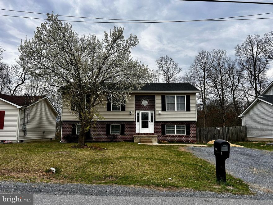 Opportunity awaits you in this centrally located split foyer, just minutes to route 11 and a with easy access to I-81. The main level features an open floor plan, with a spacious living room  and a dining area with hardwood floors.  An updated kitchen features SS appliances (2 years old) and a pantry. Down the hall are 3 bedrooms, with the primary suite having an attached bathroom. The finished lower level features newer LVP flooring and a full bathroom.  This home has a fantastic rear yard that is fully fenced, with a storage shed and large deck. Recent updates include newer carpet and HVAC that was replaced 2 years ago. The home is being sold "As Is" so come turn this gem into your dream home!