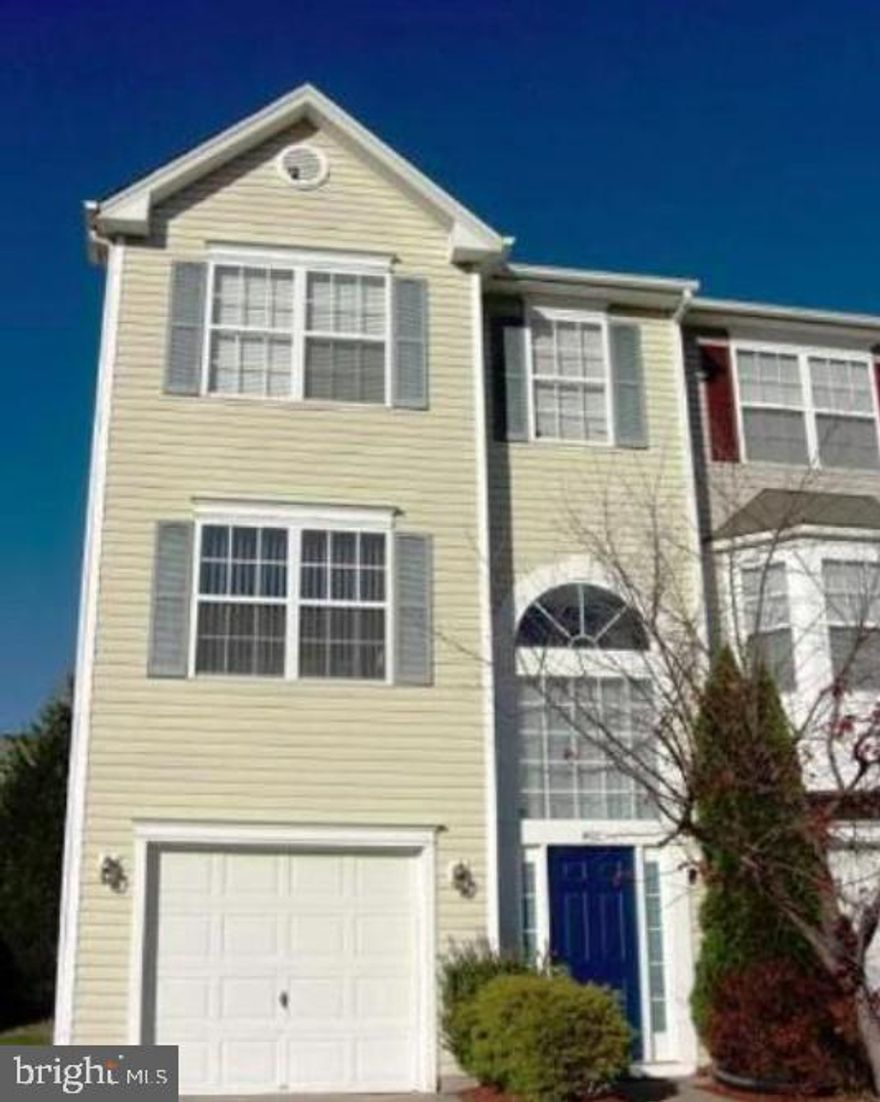 Beautiful end unit townhome, convenient to shopping and I95. Three large bedrooms, 2 Full and 1 half bath, bright and open living and dining rooms. Large eat-in kitchen, fully finished basement with attached 1 car garage, deck. Its located on a quiet street and backs to open grounds.