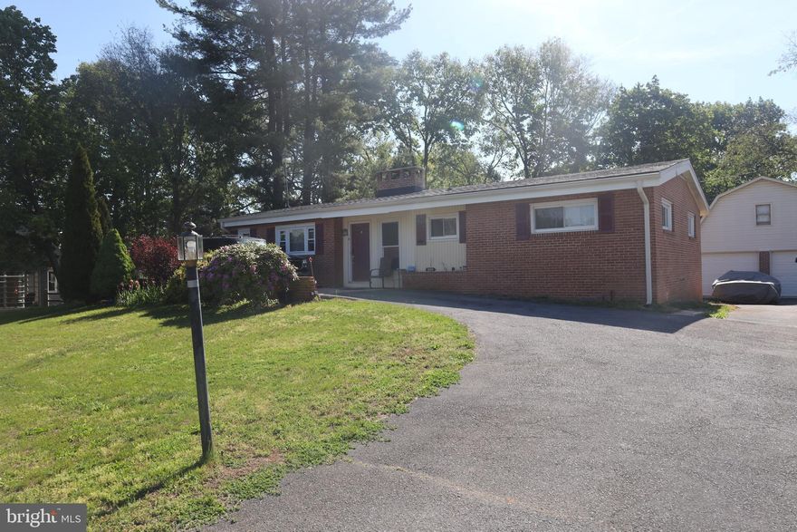 Very nice 3 bedroom 1.5 bath home in very desirable community. North end of Hagerstown. Wood burning fireplaces. Basement is finished with walkout door to rear yard. This is a unique home with exposed wood beams in living room ceiling.  Garage is oversized with large loft. Great for car enthusiast or work shop. Large rear yard.