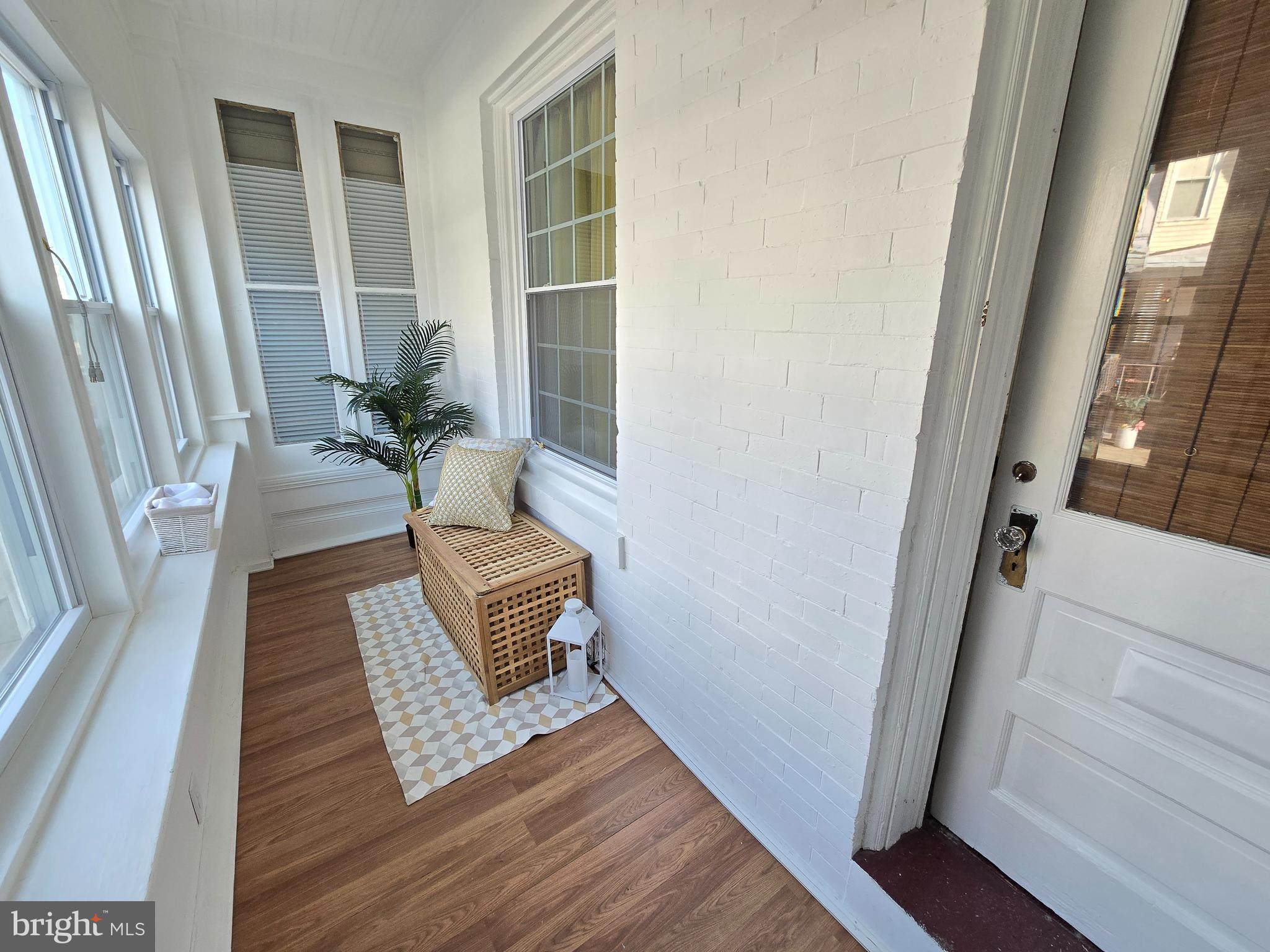 Step into the comfort of this charming, updated two-bedroom home, available the first week of October. Perfectly situated within walking distance of convenient public transportation, this location also boasts a vast array of eateries. As the new tenant, you'll be sure to enjoy the enclosed porch where morning coffee or evening reads can become your daily ritual. Features include ceiling fans, vinyl flooring throughout, on-site laundry, 2 bedrooms, and so much more! The formal dining room is ready for your personal touch to host memorable dinners or intimate gatherings. Tenant is responsible for all utilities. Housing Choice Vouchers are accepted! Limited showings as this property is currently occupied.