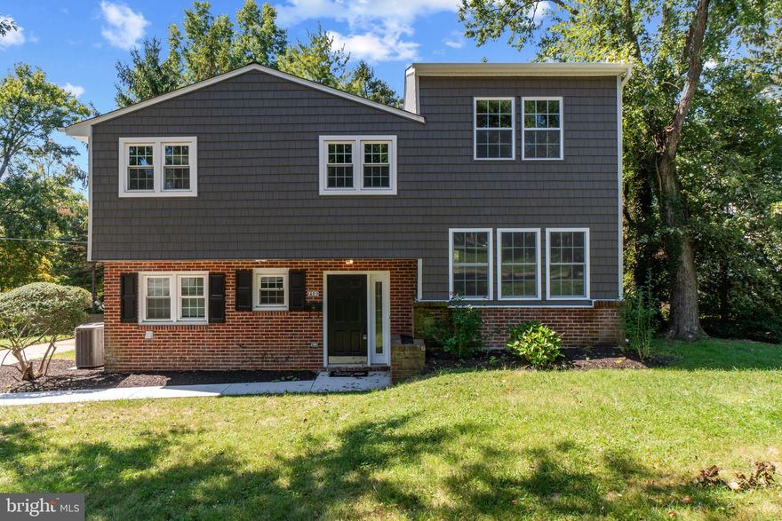 COMPLETELY RENOVATED LUTHERVILLE TIMONIUM HOME by CUSTOM HOME BUILDER VAN ALLEN HOMES NESTLED ON CORNER LOT - located just steps from Hampton Elementary School this large split-level home offers an open floor plan with refinished hardwood floors throughout, large living room, separate dining room and luxurious kitchen featuring ss appliances, custom cabinetry, tile backsplash and granite countertops leading to secluded screened in rear deck and patio area great for entertaining!  Upper levels boast 4 bedrooms, dual zone hvac system for extra comfort and massive owner suite in the recently constructed addition with walk-in closet, luxurious bathroom suite with double bowl vanity and spa-like shower.  Finished walk-out lower level offers a large light filled family room, convenient half bath and separate laundry room!