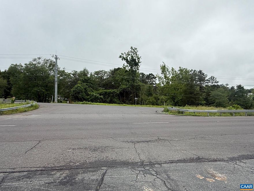 Now available?an exceptional opportunity along one of Central Virginia?s most active corridors. This 3.44-acre parcel is strategically located on US 29 / Seminole Trail South in Greene County, just north of Charlottesville, and offers excellent access, visibility, and investment potential.  Positioned at a crossover intersection, this property is flanked by significant commercial anchors including a new apartment complex, a hotel, and a bustling strip mall home to a restaurant, gym, and Dunkin? Donuts. With over 28,000 vehicles passing daily, as reported by VDOT, this site benefits from continuous high-volume exposure and convenient direct access from the southbound lanes of US 29.  The land features a mix of level and sloping topography, offering great line-of-sight to the highway and surrounding commercial development. This makes it a prime candidate for a variety of commercial uses?whether you're envisioning quick-service retail, automotive services, a medical office, or professional suites, the possibilities are wide open.  Whether you're looking to launch a business, expand your portfolio, or secure a high-traffic development, don?t miss your chance to capitalize on a site with so much potential in a rapidly growing corridor.