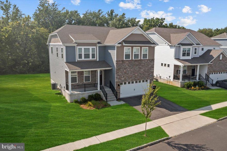 Welcome to 39 Westmont Drive – An Elegant Colonial in the Sought-After Hawthorne Community of Medford Township

Built in 2022, this stunning two-story colonial offers the perfect blend of timeless style, modern comfort, and an unbeatable location. From its charming curb appeal to its thoughtfully designed interior, every detail has been crafted for both beauty and function.

Step inside to discover bright, inviting living spaces that flow seamlessly across both levels. The main floor features an open layout, connecting the modern kitchen, dining, and living areas—ideal for everyday living and effortless entertaining. The kitchen boasts a contemporary design with plenty of counter space and cabinetry, perfect for both casual meals and special gatherings. Just off the main living area, a first-floor bedroom with a full bath offers a flexible space for guests, a home office, or multi-generational living.

Upstairs, you’ll find generously sized bedrooms filled with natural light and comfort. A partially finished basement adds even more possibilities—whether you envision a recreation room, fitness space, or abundant storage.

This home is equipped with central cooling, forced-air heating, and efficient natural gas utilities, ensuring year-round comfort. Outside, a tidy, low-maintenance yard and a two-car attached garage with a front entry add convenience and practicality. The property sits on nearly 0.2 acres, giving you just the right balance of space without overwhelming upkeep.

Located in the desirable Hawthorne subdivision, this home is part of a warm, welcoming neighborhood known for its community feel and quality schools. You’ll be within close proximity to Haines School, Medford Memorial Middle School, and Lenape High School, as well as local parks, shopping, and dining. Commuters will appreciate the easy access to major routes, making travel to Philadelphia or the Jersey Shore a breeze.

Why You’ll Love It:
Like-new quality – Move-in ready with fresh finishes and modern touches.
Flexible layout – Main-level bedroom suite adapts to your lifestyle needs.
Low upkeep – Easy-to-maintain yard and HOA services.
Prime location – Excellent schools, community amenities, and a peaceful setting.

Don’t miss your chance to own this exceptional home in one of Medford Township’s most sought-after neighborhoods—schedule your private tour today!