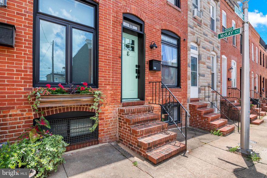 Welcome to 823 S Decker Avenue, a stunning brick-front rowhome located in the heart of Canton, offering the perfect blend of luxury, comfort, and city living. This beautifully maintained home features two spacious bedrooms, each with its own ensuite bathroom, providing ultimate privacy and convenience. The owner's suite is a true retreat, complete with a private deck perfect for morning coffee or unwinding after a long day. Upstairs, a show-stopping rooftop deck awaits, offering panoramic city views and the ideal setting for entertaining or relaxing under the stars. The gourmet kitchen is a chef’s dream, featuring gas cooking, high-end appliances, granite countertops, and ample cabinetry—all flowing seamlessly into the open-concept living and dining areas. A finished basement provides additional flexible space and includes a convenient half bathroom, ideal for a home office, gym, or guest space. The second-level laundry makes everyday living a breeze, while private parking in the rear ensures hassle-free city life. Situated just steps from Canton Square, Patterson Park, waterfront dining, and boutique shopping, this home truly offers the best of Baltimore living. Don’t miss your chance to call this exceptional property your own.
