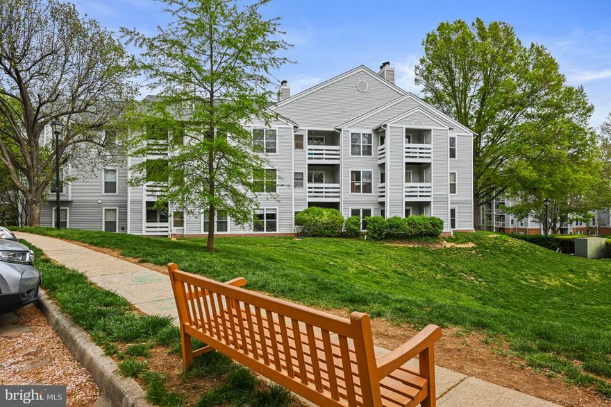 Welcome home to this well-maintained 2 bedroom  ground floor condo at Four Winds at Oakton!  This condo features new LVP flooring and fresh, neutral paint throughout.  Other updates include a brand new stainless steel oven and microwave! Stay warm by the crackling fire of the wood burning fireplace or step outside in warmer weather to enjoy some fresh air on the private patio. The kitchen features granite countertops, stainless steel appliances, plenty of cabinet space and a breakfast bar for extra seating. Storage abounds with a large walk-in closet in the primary bedroom, a storage area in the washer/dryer closet and an additional hall closet for coats or linens.  Amenities include a community pool, fitness center, clubhouse, community garden and the convenience of the nearby Bore Street Park. Ample parking can be found near the unit and there is easy access to 66, 123, 495, the Vienna Metro, bus routes, shopping and dining.