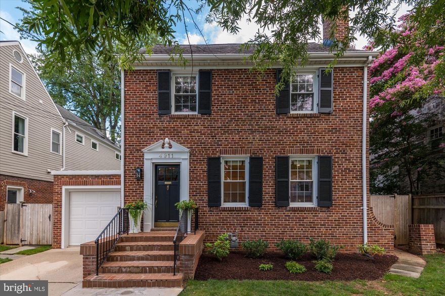 Welcome to this beautifully updated and spacious colonial featuring an expansive family room and kitchen addition with soaring ceilings, and warmly situated on a quiet tree-canopied, park adjacent street in coveted Chevy Chase West.  As you approach the property, you'll be charmed by the curb appeal anchored by the fresh landscaping.  Entering the home, you're greeted by gorgeous hardwood floors throughout the main level, which is blanketed in natural light. Just off the foyer, an arched entryway ushers you into the spacious living room, featuring a wood burning fireplace, 4 windows, decorative molding and chair rail detailing, which extends into the formal dining room.  Walking through the welcoming entry hallway, you'll pass the updated powder room (2023) and enter the light-filled addition with southern exposure, where you'll be soaked with natural light from a wall of windows and meticulously placed skylights from the soaring 12.5' ceilings.  The recently updated kitchen (2021) features brand new appliances and an oversized quartz island with storage throughout and counter-height seating, perfect for gathering family, friends and food! The kitchen offers an abundance of storage, including a sliding-shelf pantry, a beautiful subway tile backsplash, under-cabinet lighting, an elegant mix of glass-front and solid cabinets, and a nearly excessive amount of quartz countertops. Flow out of the family room / kitchen, you'll step into a seemingly interconnected flagstone patio, perfect for dining al fresco, entertaining and outdoor living! The intimate backyard is fenced in for privacy and features beautiful low maintenance hostas and yews, trees lining the back perimeter that create an additional layer of privacy for all three-levels, and latched fence door entrances with flagstone paths from both sides of the house.  On the upper two levels you'll find 3 sizable bedrooms plus a bonus room, perfect as an office or nursery, and 2 full baths.  The Owner's Retreat features an updated en-suite bathroom (2021), skylights, and amazing treetop views!  Access the attic for extra storage.  The basement houses a new smart washer / dryer set (2020) and is ready for you to realize its full potential!  There's plenty of space for an extra bedroom, game room, hang-out space, exercise room - the options are endless!  Enjoy an attached garage with a 2nd refrigerator and smart garage door opening up to a dedicated driveway with two off-street parking spaces.  100% of the home's common areas have Smart lighting and heating and cooling is managed by Smart Thermostats.  New water boiler in 2020.  AMAZING LOCATION! Close proximity to BOTH Downtown Bethesda AND Friendship Village.  Access shopping and good eats, including Saks Fifth Avenue, Bloomingdales, Bethesda Row, Mon Ami Gabi, True Foods Kitchen, and Clyde's of Chevy Chase.  Plus, Trader Joe's (x2), Whole Foods (x2), and Amazon Fresh are nearby for your daily needs. Access the heart of Georgetown dining and nightlife with one turn and a 20 minute-drive down Wisconsin Avenue.  UNMATCHED GREEN SPACE ACCESS. The street backs up to the vast and bucolic Norwood Park, putting you just moments away from basketball & tennis courts, two playgrounds (a tot lot and full size), multiple baseball fields, picnic tables, a secret off-leash pet destination, and a co-op nursery school.  Take the Little Falls Trail stairs,  just a few houses down, and be at the Crescent Trail or the Bethesda Pool in 3-4 minutes, both so close to home!  Trek on a few more minutes to experience the Kenwood Cherry Blossoms in the spring.  COMMUTERS' DREAM! Bethesda Metro is conveniently close (prior owners walked to Bethesda Metro via the Crescent Trail every workday), and you're near major commuter routes (Wisconsin Ave., River Road, and I-495).  Kids can commute too (to Somerset Elementary in the mornings)!  Don't miss your chance at this exceptional home in this adorable neighborhood with an incredible location. Welcome Home!