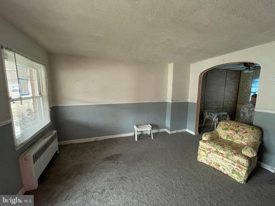 PRICE APPROVED BY LENDER. Cozy townhouse located in a quiet neighborhood. House was loved and cared for by current owners for almost 50 years and is in need of TLC to get it back up to it's full potential. With the good bones, this house will be perfect in no time - needs work. NO offers will be accepted until 15 DOM.