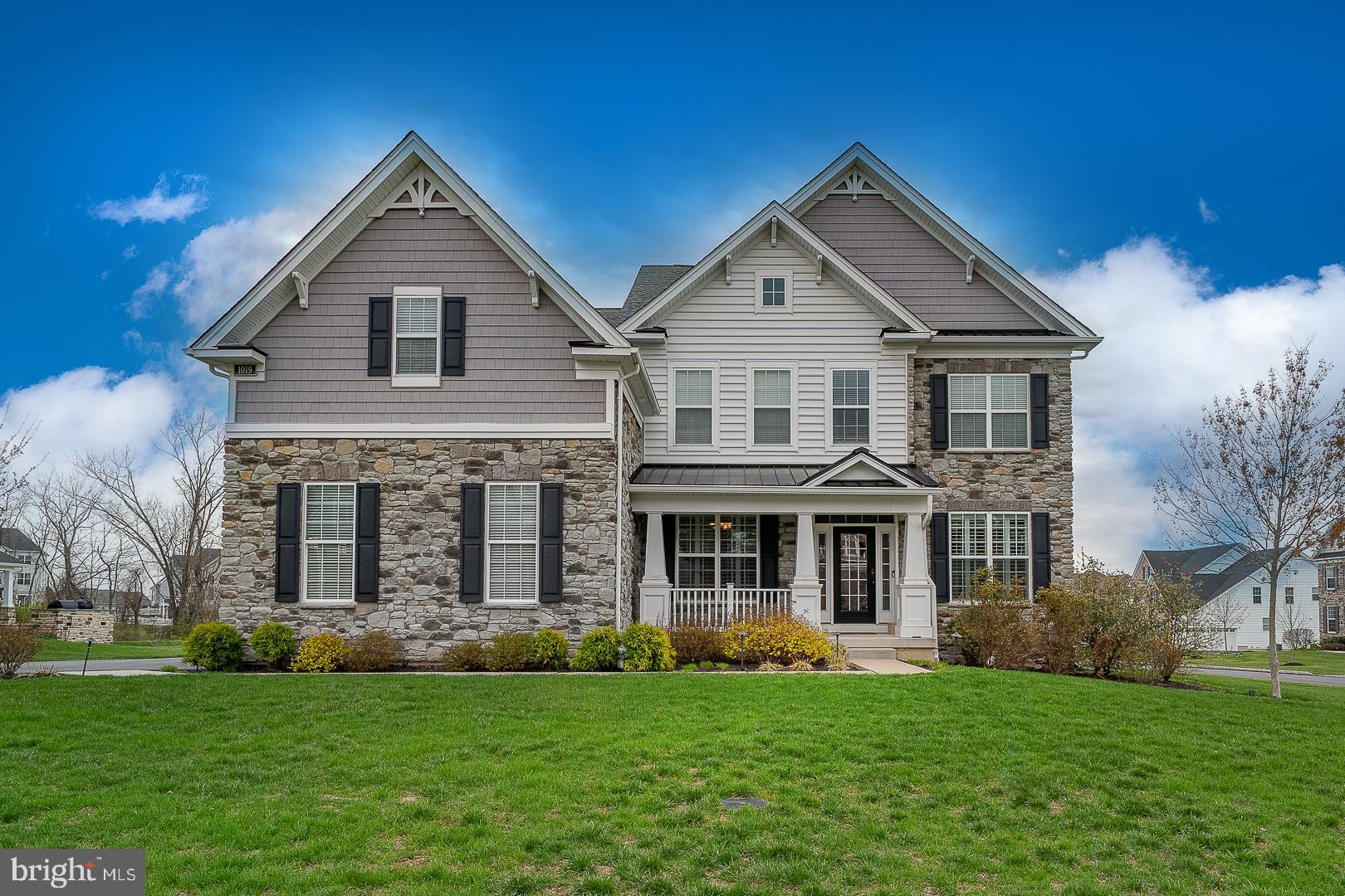 Welcome Home to 1019 Iron Works Rd, at the Preserve at Kimberton Glen in Phoenixville. The home features 4 bedrooms, 2.5 baths, a walkout basement already plumbed for another full bathroom, and a 2 car garage. This 6 year young , well maintained home has a spacious Entrance hall, quiet Living room, large Dining Room, private Office and spectacular Family center with upgraded Century Kitchen, including Hardwood flooring, Granite countertops, gourmet Island, Pantry, and attached Great room with recessed lighting. From the Great room you can access the oversized Trex Deck w/ built-in lighting, Mud room and Garage. The covered front porch welcomes everyone before entering the Foyer. The open concept area includes a Gourmet Kitchen and breakfast area, and features a large island with storage. There are many upgrades in the kitchen including the Granite countertops w/subway tile backsplash, upgraded 42” kitchen cabinets with trim package, pull-out trays, upgraded appliances as well as a large kitchen pantry. The large island lets any gourmet cook have plenty of space to prep and entertain. There is a Wall Oven & Microwave and upgraded hooded vent, and a 5-burner gas cooktop. The first floor office can be used however you like, as an office, a reading room/library, a playroom, or an exercise room. A large Mud Room with cubbies is found leaving the oversized garage and can be used for additional space/storage. The garage has 2 garage doors, has a storage area in front and sides & garage openers. The second floor has a huge Primary suite w/ sitting/dressing area, dual Walk-in Closets, tray ceiling, and luxurious Bath suite. The primary Bath, all upgraded, features separate vanities, oversized walk in Shower and soaking tub. There is also a private commode w/door for privacy. The generously sized second (with walkin closet), third and fourth bedrooms share a hall Bathroom. The oversized laundry room is located on the 2nd floor with Washer & Dryer . The walkout Basement is finished into a versatile space for a gym, a workshop area, a play area, and large storage area. This home is well priced and surrounded by homes selling for $1M+ in the same neighborhood. Located minutes from downtown Phoenixville offering antique shops, artistic boutiques, breweries, and local restaurants. Lots of seasonal events. Besides local Shopping in downtown Phoenixville - KOP Mall & Limerick Outlets too. Plenty Outdoor activities, biking, hiking Valley Forge Park trails & more. Accessibility to major routes, PA turnpike, 29 & 202.