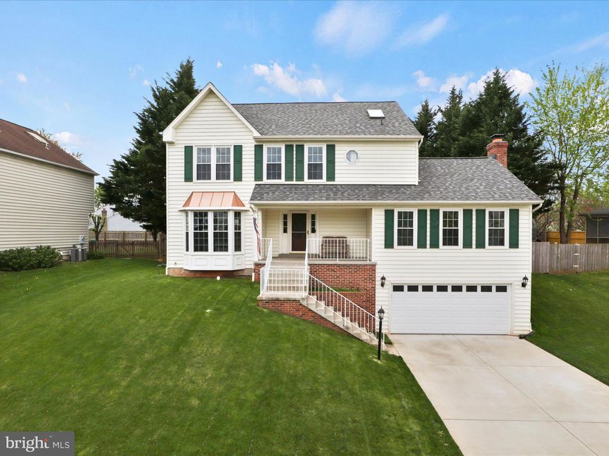 Welcome to this beautiful, light-filled 4 bedroom, 3.5 bath home with a lovely front porch. The main level features spacious living and dining rooms, a large family room with a fireplace, breakfast area with access to back yard, and a gorgeously renovated kitchen with island and hardwood floors. Upstairs are 4 bedrooms and 2 bathrooms, including the large owner’s suite with ceiling fan, bathroom with soaking tub, and a large walk-in closet. The finished lower level has family room with a gas fireplace with stone surround, a wet bar, and full bath. Beautiful fenced in backyard with a spacious deck. Located close to shopping, restaurants, entertainment and major transportation routes. Dogs okay but no cats. 12, 24, or 36 month lease length desired. No short term rentals.