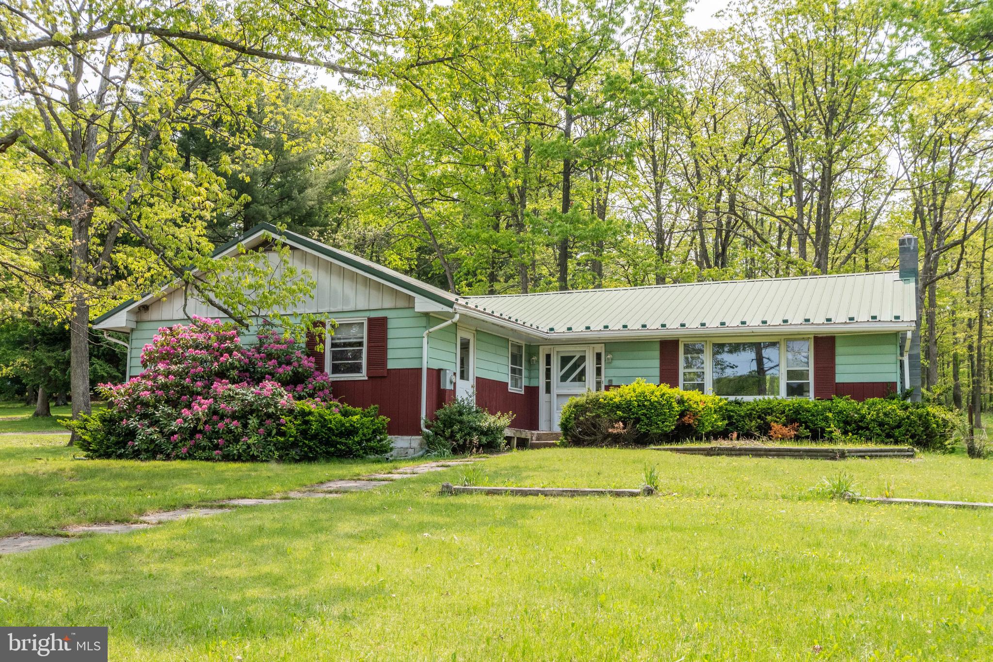 Great opportunity with tons of potential! This home features 4 bedrooms, 2 baths, and offers over 3,500 square feet. With a few renovations and some TLC, this will be an amazing property! A nice sized 1.2 acre lot adds more possibilities of creating an enjoyable outdoor space. The location is wonderful as well, situated near the southern end of Deep Creek Lake and only minutes to Oakland! Don't miss out on this one, call today to schedule your tour!