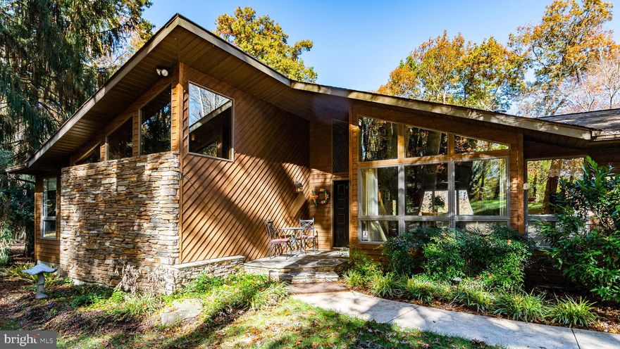 Beautiful 3 Bed,2.5 Bath ranch/contemp style home, newly updated kitchen and baths,heated floors in the master bathroom, custom Craftmade cabinets in kitchen and master bathroom, Brazilian cherry floors in bedroom,self closing drawers, finished walkout lower level, large rear deck with a screened-in porch, overlooking landscaped yard, large barn with second floor, very private setting!