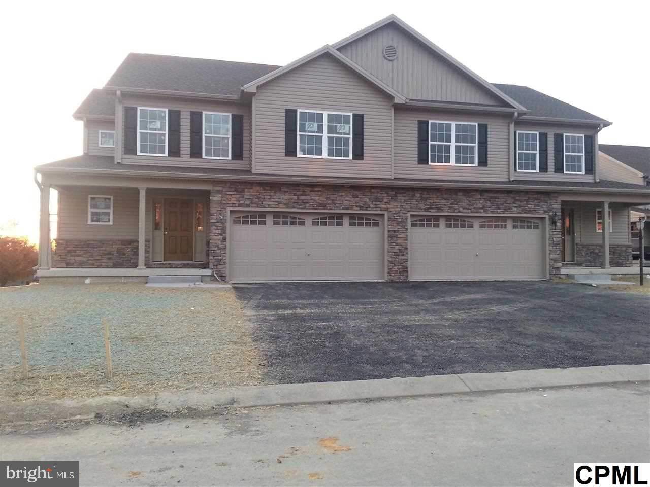 The Cameron Duplex by McNaughton Homes for Comp Purposes Only. Similar home pictured.