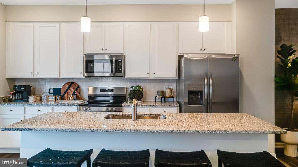 Photo of 415 Silver Birch Drive #HS 233, RANSON, WV 25438 (MLS # WVJF2025570)