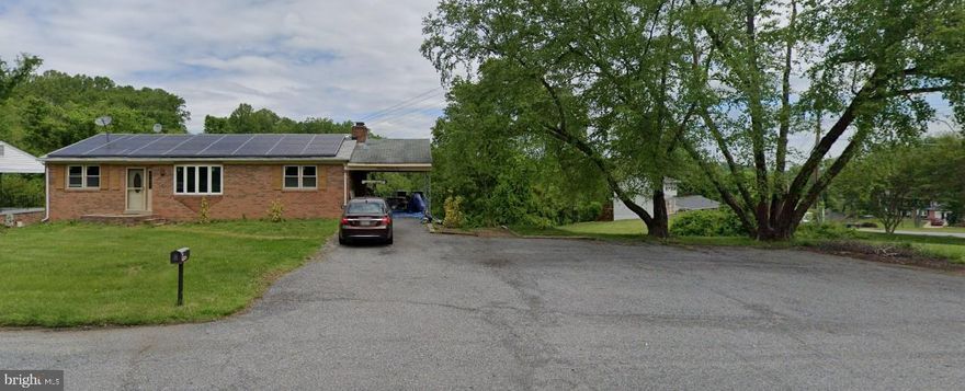 Handyman Special! Here is a great opportunity for a savvy investor to buy below market value. This house has 4 bedrooms, 3 full bathrooms, and tons of space. The house sits on a corner lot with over 2 acres, parking for 6 or more cars, and 2600 sqft + of finished living space. Please do not bother the resident at all!  Contact the listing agent with any questions or for showing access.