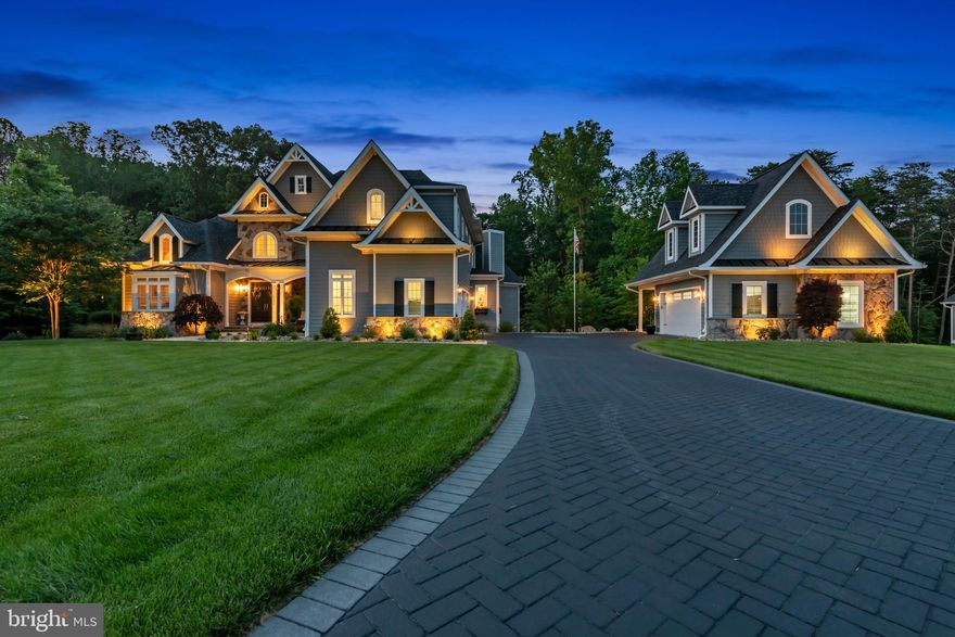 Welcome to an extraordinary residence in the exclusive Severn Highlands community. This stunning 6-bedroom, 5.5-bathroom detached home offers over 6,500 square feet of meticulously designed living space, blending timeless elegance with modern comfort. Step inside to find soaring ceilings, expansive rooms, and high-end finishes throughout. The gourmet kitchen is a chef’s dream, featuring Wolf stove and sub zero refrigerator/freezer, and dual dishwashers and a pot filler , custom cabinetry, and a large center island perfect for entertaining. The open-concept layout flows seamlessly into the light-filled living and dining areas, creating a perfect space for both everyday living and grand gatherings. Retreat to the luxurious primary suite, complete with a spacious sitting area, walk-in closets, and a spa-inspired ensuite bath. Generously sized secondary bedrooms offer comfort and flexibility for guests or home offices.  The fully finished lower level provides additional living space, ideal for a media room, gym,  recreation area and Custom built Bar. Outside, enjoy the peace and privacy of a beautifully landscaped yard, a hot tub that provides a luxury oasis under a pavilion, nestled within a quiet, upscale enclave with Stone wood burning  fireplace that is a vacation by itself and a  TV above the fireplace. Located in the sought-after Severn Highlands subdivision, this home offers privacy, prestige, and convenience—just minutes from major commuter routes, shopping, and top-rated schools.  Yard Irrigation, Custom Landscape lighting ...to enhance out door living . Don’t miss your opportunity to own this exceptional home in one of Millersville's most desirable communities. Detached Garage with 2 inside spaces and a  car port for an additional car. Unfinished area upstairs for possibly an in law suite addition. Solid wood doors throughout the home and Baldwin hardware. Under counter ice maker new in 2025.  Quality, Quality, Quality ...This home is a must see! Backs up to 200 acres of protected wooded conservation and this lot will accommodate a swimming pool. Full house generator27kw, full house humidifier, exterior cameras , main floor novo blue tooth sound system.