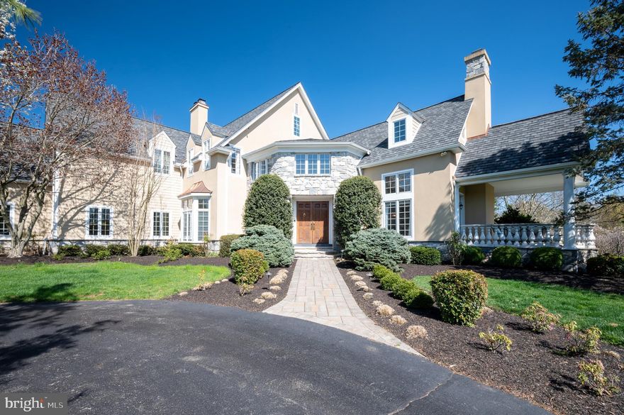 Beautifully maintained and renovated executive estate located in the Greenville neighborhood of Stoney Run. With only 13 homes, this exclusive neighborhood is located about a mile from the shops and dining of Greenville proper. As soon as you enter the home you can feel the openness of the floor plan with direct site lines into the living, dining, and family rooms as well as an open staircase overlooking the two-story foyer and family room. Elegant living room features a fireplace flanked by French doors leaving to a covered terrace. A floor to ceiling stone fireplace is the center focal point of the family room with vaulted ceiling. The spacious eat-in kitchen is a cook’s dream with abundant counter space, Subzero refrigerator, professional grade 6 burner range, and ample cabinetry to store all your tools. A renovated butler’s pantry is perfect for a coffee bar or wet bar when entertaining and doubles as an office for day-to-day needs. The main living area is complete with formal dining room, gorgeous, renovated powder room, and large mudroom/laundry room. Private entry door from the driveway leads into the in-law suite perfect for long term guest or live in au-pair. The suite features living room, bedroom with morning kitchen and private full bathroom. The living room has access to its own small outdoor space perfect to enjoy a cup of coffee and take in the view. Upstairs you will find an owner’s suite with all the amenities you would hope for – large bedroom with two-sided fireplace, sumptuous bathroom, huge walk-in closet with dressing area, and an office that shares the fireplace with the bedroom. The office has built-ins and doubles as a 2nd walk-in closet. There are three additional bedrooms, two bathrooms and a bonus room on this level. The bonus room has a variety of uses that vary from yoga studio to playroom or even another home office if needed. Go up one more level to find a large bedroom suite with private bathroom and sitting area. Finished lower level includes media area, exercise room powder room, wine closet and large recreation gaming area with fireplace and a full kitchen that features a stunning natural edge wood countertop. There is still ample unfinished space for storage. The home is ideal for entertaining all year round with a stunning outdoor living space that includes an in-ground pool, hot tub, and pool house. Nicely landscaped 3.62 acres affords privacy and beauty. This home offers a wonderfully flexible floor plan ready to suit any buyer’s needs and allows for an ease in entertaining in any season.