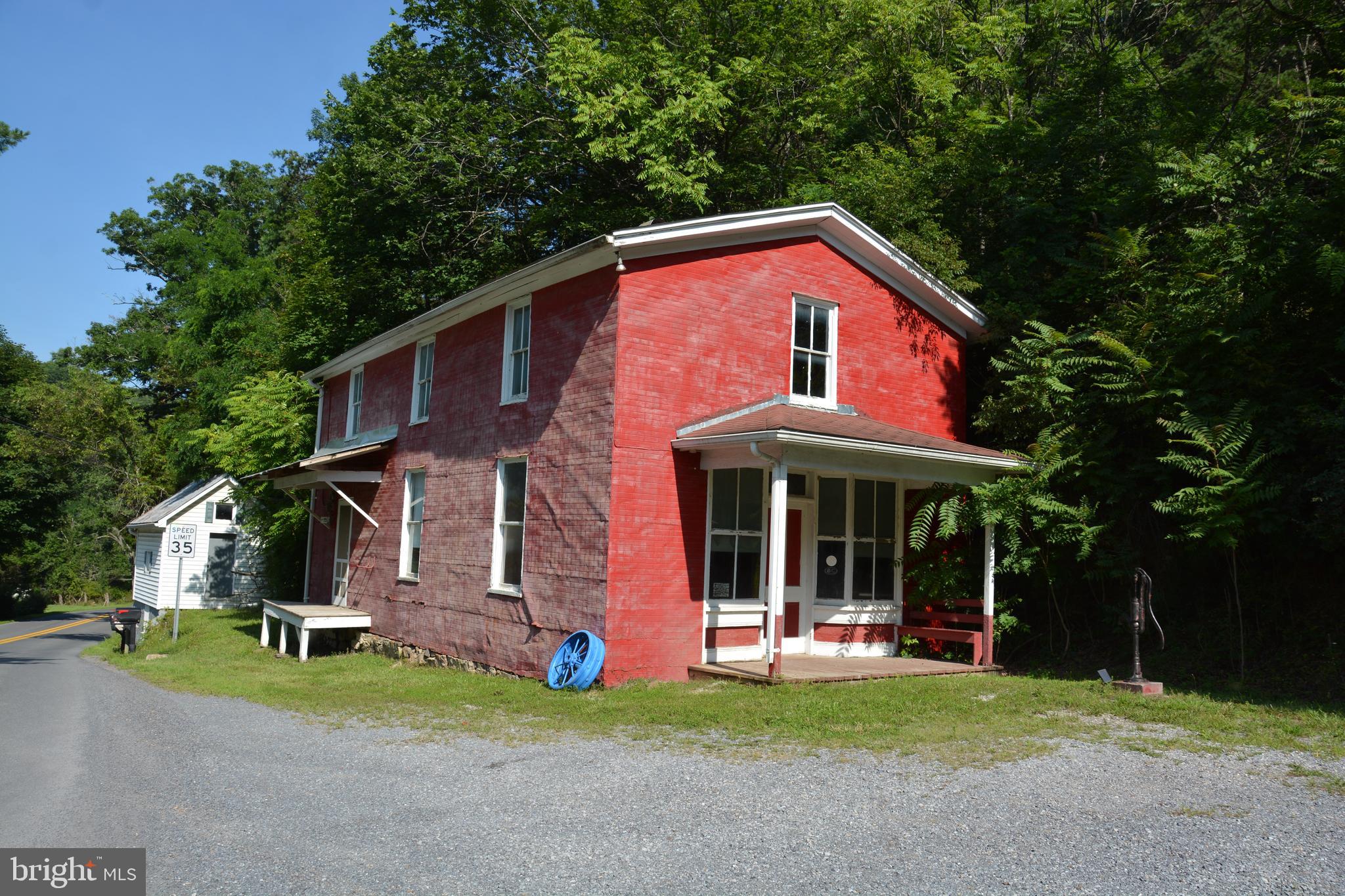 A real investment opportunity here. This was formerly the neighborhood General Store in Capon Springs. Use your imagination to figure out what you might do with the property. It would pay for itself in the long term if you just used it for storage. Possibly you have a hobby that would make this old store a great place for consideration. The lot size is over 1.5 acres, much of that is hillside behind the store. No record on when the store was built but locals are suggesting prior to 1900. The smokehouse/springhouse also makes for an interesting addition, measuring 15 x 10 and in great condition. The store itself measures 50 x 24, and is two story, has old shelving and wood floors. The Historic Capon Springs Resort is just a mile down the road.
