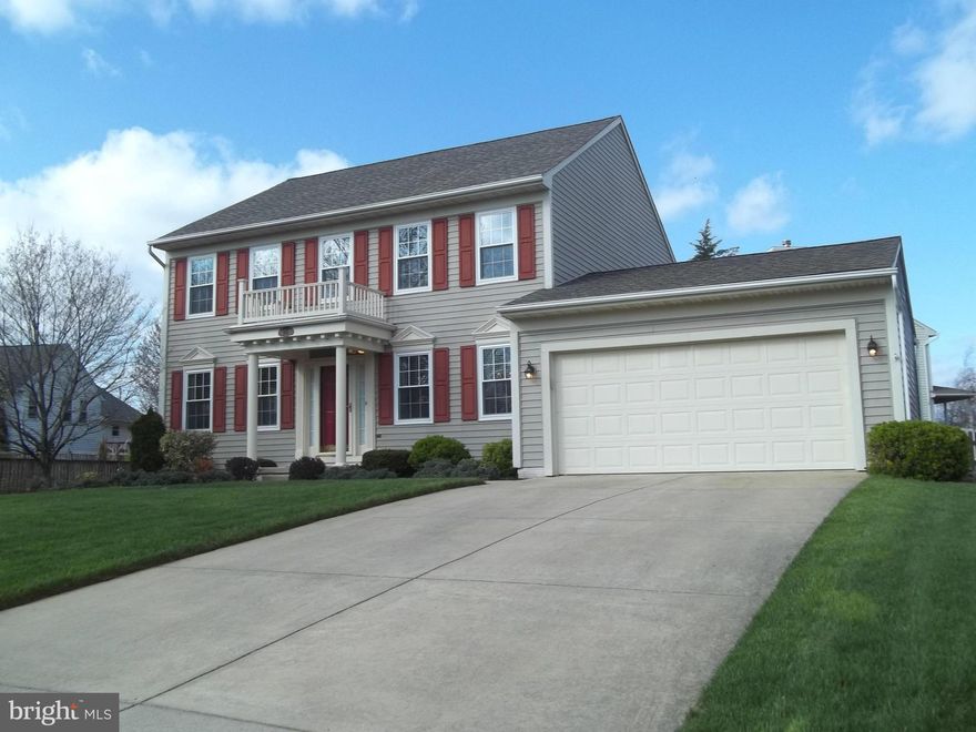 JUST PERFECT-gleaming new wood floors, chair rail & crown molding, upgraded light fixtures, replaced bathroom & kitchen spigots, upgraded stainless appliances, refaced cherry cabinetry, granite kitchen counters, cultured marble bath vanities, replaced sump pump, most windows are new plus a five year old roof...in short...just about a new four bedroom home ...with a NEW AFFORDABLE PRICE..