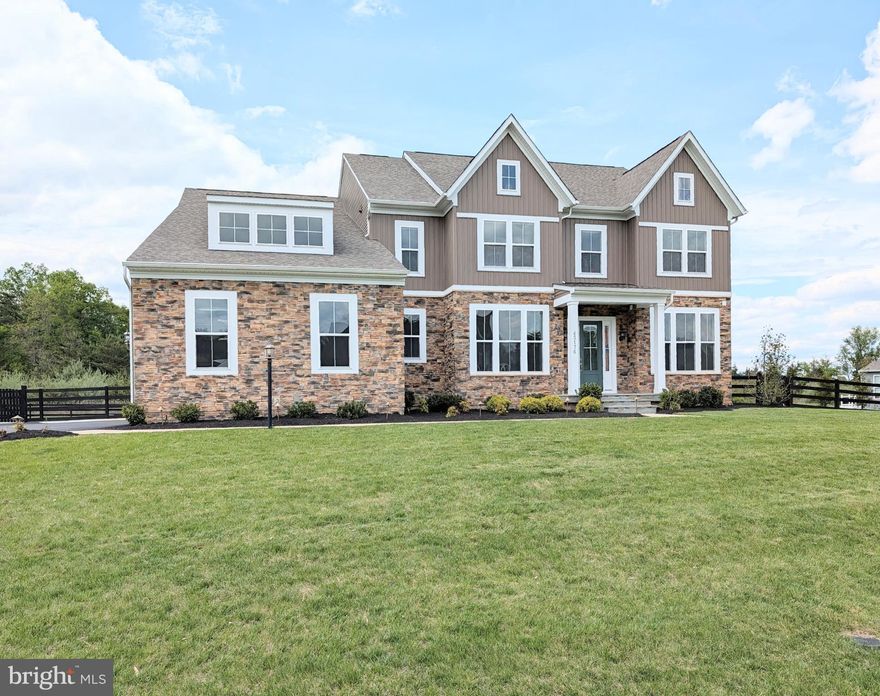 Exceptional Stanley Martin Landon in Reserve at Holly Springs with nearly 7,600 finished sq ft on a rare 0.80-acre homesite backing to woods with additional wooded privacy and no direct neighbor on one side. This heavily upgraded 6-bedroom, 6.5-bath home delivers luxury scale, privacy, and true indoor-outdoor living, with over $250,000 in thoughtfully designed post-build improvements focused on outdoor living, entertainment, and premium finishes. The main level features custom 9-foot interior doors, 7-foot windows, extensive recessed lighting, coffered ceiling, fireplace, elegant gallery-style flow, formal dining, private study, and a main-level bedroom suite with upgraded full bath, standing shower, and frameless glass door. The gourmet kitchen includes upgraded cabinetry, quartz countertops, upgraded diagonal backsplash, cabinet lighting above, below, and inside, large island, oversized pantry with outlets, and a custom butler’s pantry with solid stained maple built-ins, quartz counter, and beverage cooler.

The upper level offers a spacious owner’s suite with large sitting area, oversized walk-in closet, and upgraded spa-style bath with Level 4 tile and large walk-in shower. Three additional upper bedrooms, upgraded baths, laundry, upper flex space, premium ceiling fans, blinds, and added recessed lighting complete the level.

The finished walk-up lower level is built for serious entertaining and everyday flexibility, with an L-shaped wet bar, cabinetry, sink, full-size refrigerator, beverage cooler, large recreation areas, finished bedroom/gym with insulated ceiling, walk-in closet, upgraded bath, secondary media space, and a fully sound-isolated Dolby Atmos theater with sound shakers, 15 speakers, and 2 subwoofers.

The exterior is a standout: approximately 2,000 sq ft thermal full-color flagstone patio with custom brass stone propane firepit, reinforced slab, accent lighting, hardwired app/voice-controlled string lighting, brass step lighting, additional exterior lighting, extensive outdoor electrical/water/LAN wiring, 11-zone Rachio irrigation, privacy landscaping with Thuja Green Giants, 445 linear feet of pool-compliant fencing with wire mesh, professionally installed gutter guards with exterior vent guards, and professionally finished full-flake epoxy garage flooring.

Enjoy quiet evenings outside with a drink, listening to birds and taking in the wooded backdrop, or gather for s’mores around the propane firepit without worrying about smoky clothes.

A rare combination of luxury finishes, premium systems, usable space, privacy, and outdoor living in one of the area’s most impressive homes.