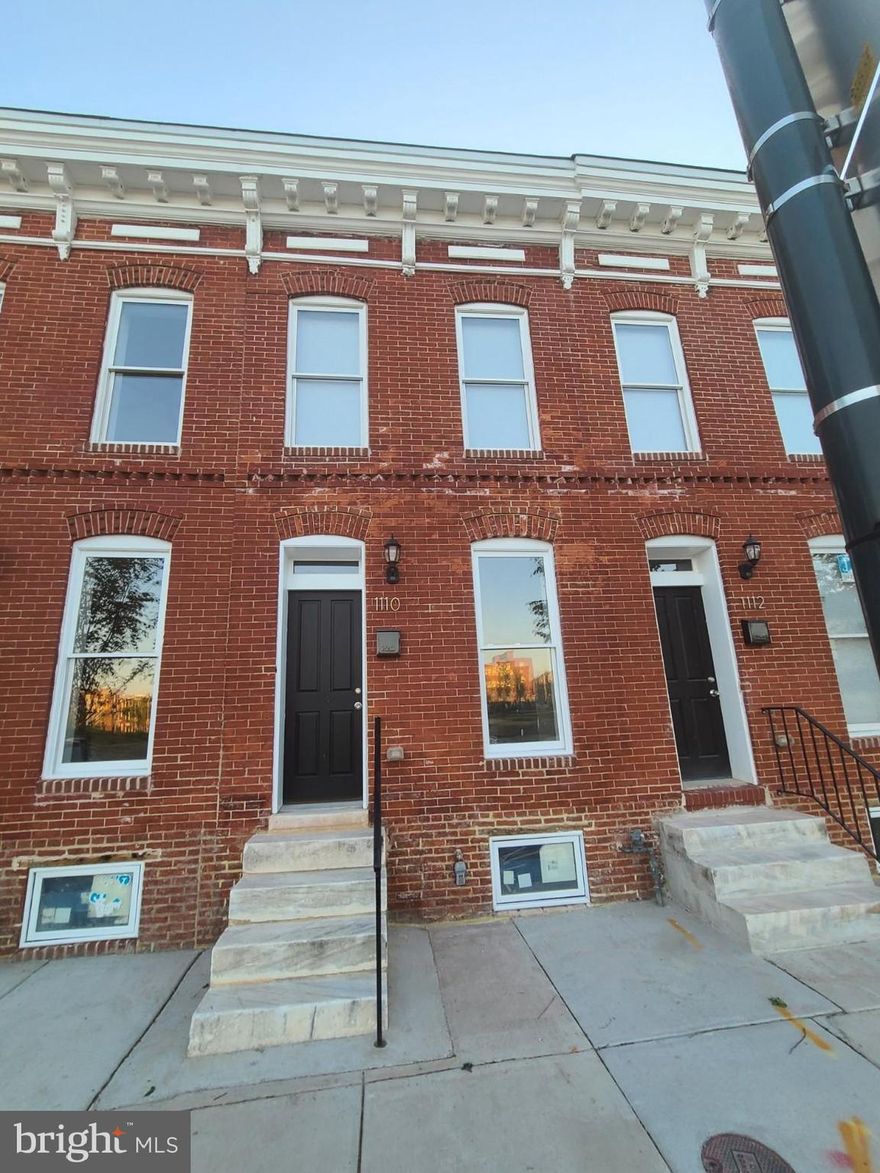 This is a totally renovated townhouse in the John Hopkins Hospital area of Baltimore City known as the East Baltimore Historic District.  There are two bedrooms of the two floor and two bathrooms.  The first floor has a half bath and washer and dryer. There is a finished basement with a full bathroom, Parking Pad in the back or street parking.  Granite Kitchen counters, and stainless-Steel appliances.   The house also has an approved Historical Property Tax credit and is eligible for the vacant to value credit of $10,000.00 thru the City of Baltimore.   It is available for immediate occupancy.  Show and Sale.