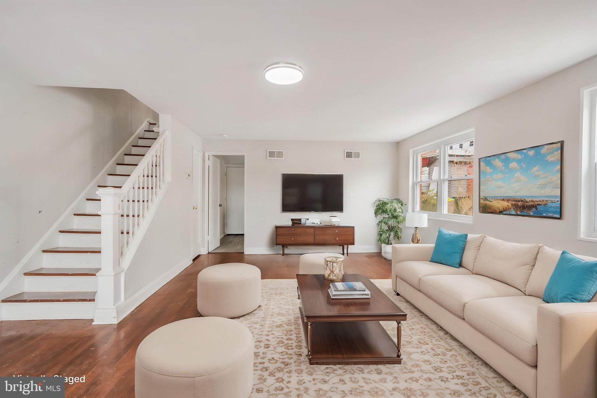 Beautifully maintained and freshly painted, this charming semi-detached home is nestled in the heart of Riverdale. Featuring an all-brick exterior and windows on all three sides, the home is filled with natural light throughout. Inside, you’ll find three spacious bedrooms and a full bath, along with gleaming hardwood floors that add warmth and character.
The kitchen offers ample cabinet and counter space, making meal prep a breeze. Step outside to a fantastic backyard—perfect for relaxing, gardening, or entertaining guests.
Enjoy the convenience of easy access to public transportation, shopping centers, and major routes including I-495 and the Baltimore-Washington Parkway.
To help visualize the home’s floorplan and highlight its potential, virtual furnishings may have been added to photos included in this listing.