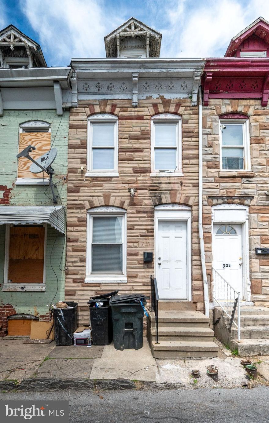 Great investment opportunity at 235 Hudson St! This income-producing property is currently rented for $1,200/month with the tenant paying all utilities—making it an excellent addition to any portfolio.

The first floor features a spacious living room and a large kitchen, offering plenty of room for comfortable living. On the second floor, you’ll find two bedrooms (one being a walk-through) along with a generously sized full bathroom. The third floor adds even more value with an additional bedroom—perfect for maximizing rental potential.

Whether you’re looking to expand your rental portfolio or secure a property with immediate cash flow, this one checks the boxes!