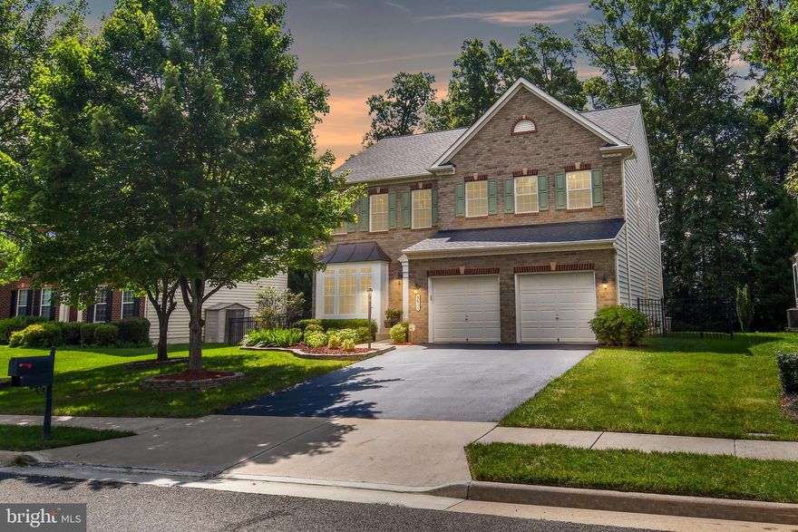 🏡 Welcome Home ! ✨This stunning 4-bedroom, 4.5-bathroom brick-front home offers the perfect blend of elegance, comfort, and thoughtful, high-quality upgrades. From the moment you step into the dramatic two-story foyer, you'll be captivated by the attention to detail and pride of ownership throughout. The main level features gleaming hardwood floors, a spacious home office, and a sun-filled family room with a tray ceiling and cozy fireplace—ideal for everyday living and entertaining. At the heart of the home is a beautifully renovated gourmet kitchen, boasting new white cabinets with soft-close doors, pull-out trays, granite countertops, stainless steel appliances, and a large center island with breakfast bar. The kitchen flows seamlessly to a low-maintenance Trex deck, which leads to a stone patio with built-in seating and a fully fenced backyard. A pet ramp off the deck is a bonus for furry family members! Perfect backyard Oasis.

Upstairs, you'll find four generously sized bedrooms, including a luxurious primary suite, and three full bathrooms. The hallway features upgraded wide crown molding, adding even more character. The laundry room is on the top level as well. 

The finished lower level is a true entertainer’s dream with a media room, projector and screen, and a custom wet bar updated with vinyl plank flooring and granite countertops—perfect for movie nights, game days, or hosting guests. Two large storage rooms offer flexibility to add additional bedrooms, a gym, or a den. A full bath completes the lower level.

🛠️ This home has been extensively upgraded and meticulously maintained: Hardwood floors installed on main level, Tray ceiling in family room, New kitchen cabinets (2019), New roof with 50-year warranty (2024), 2 new A/C units with 10-year warranty (2020), 75-gallon hot water heater with circulator pump, overflow system, and flood alarm (2016), Whole-house humidifier (2016), EnviroAire air purifying system (2024), Termite prevention system installed (2024), and much more!

Additional highlights include fresh paint throughout, new carpet, an in-ground sprinkler system, wide crown molding, and a two-car garage. This home is truly move-in ready and packed with value.

📍 Located just off Hoadly Road, with easy access to shopping, dining, major commuter routes, this home offers both convenience and connection in a peaceful community setting.

✨ This home truly has it all—space, style, updates, and location. Don’t miss your opportunity to make it yours!