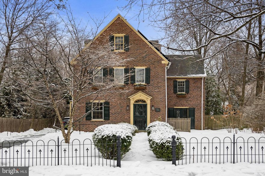 It’s rare to find this seamless blend of historic charm and modern comfort on one of Chestnut Hill’s most coveted “Top of the Hill” streets. Thoughtfully reimagined, this exceptional residence preserves its original architectural character while offering the updates today’s lifestyle demands. At the heart of the home is a recently renovated custom kitchen designed for gathering. Featuring stunning oak cabinetry, Café appliances, quartz countertops, elegant brass hardware, and a beautifully appointed bar area with wine and beverage refrigeration, the space is both warm and sophisticated.
The first floor offers a bright, flexible layout tailored to modern living. A gracious dining room lined with windows provides the perfect backdrop for entertaining. The inviting family room/den showcases a fireplace, built-in bookshelves, and direct access to the rear terrace. Just beyond, a pass-through library leads to an additional living space currently used as a living room—complete with a deep wood-burning fireplace and sliding glass doors opening to the terrace. A newly renovated laundry and mudroom with generous storage, cubbies, and a coat closet adds everyday convenience.
Upstairs, the second floor offers four to five bedrooms, depending on your needs. One room is currently styled as a sophisticated home office with custom built-ins and a desk, while another adjoins the primary suite and serves as a spacious dressing room. Three full bathrooms enhance the versatility and comfort of this level.
The third floor provides four additional bedrooms, including one currently used as a playroom/family lounge—ideal for guests, hobbies, or flexible living arrangements.
This stately brick home is rich with amenities, including central air, three-zone heating, refinished hardwood floors throughout, fully updated electrical (with all knob-and-tube wiring removed in 2019), a renovated first-floor powder room, and solar panels. A detached two-car garage sits just steps from the house and features a second-floor loft with a newly installed mini-split system for heating and cooling—offering endless potential for a studio, office, or guest space.
The private, fenced, professionally landscaped backyard is set on a rare, expansive flat lot with and includes a basketball court installed behind the garage. Multiple access points from the main level lead to the rear terrace, creating effortless indoor-outdoor living.
Located just steps from Germantown Avenue’s shops and restaurants, convenient to the R7 and R8 SEPTA rail lines, and within walking distance to the scenic trails of Wissahickon Valley Park, Morris Arboretum, and Woodmere Art Museum, this historically registered home offers the best of location, lifestyle, and legacy.