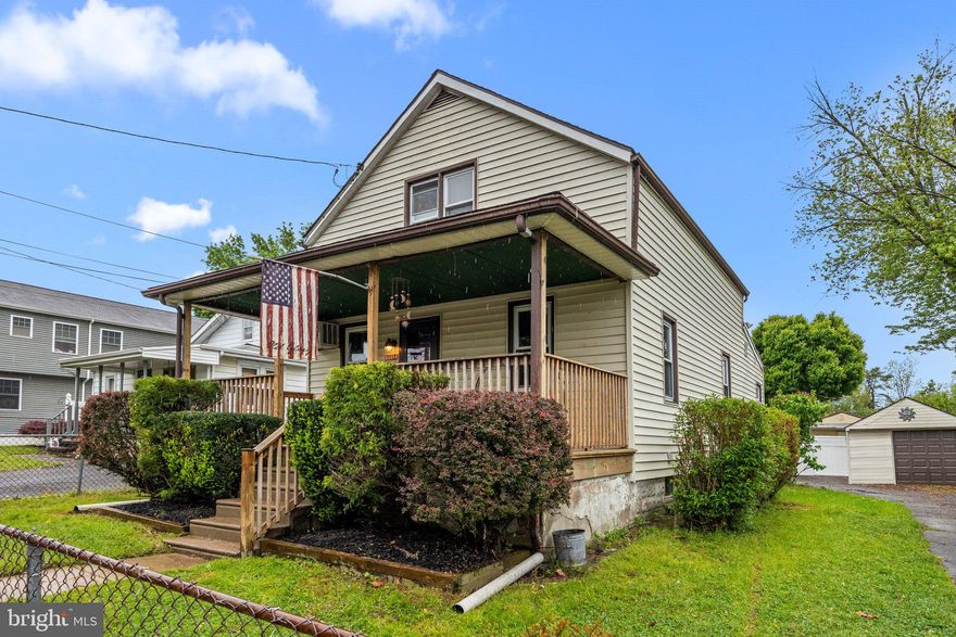 Keep your monthly payment low!  Low taxes of only $3019 make this Cozy cape located on deep fenced in lot with oversized detached garage and basement very affordable. This home is just waiting for you to move in.   Pull up, and you'll imagine yourself relaxing on the large covered front porch which spans the entire width of the home.  Enter and you'll notice the freshly painted living/dining room combination, featuring wood trim, a stone wall with free standing wood stove and slate hearth and shelving, wall to wall carpet, built in wall A/C, and three ceiling fans. The wood stove has been used to heat the home in the past, also helping to keep fuel costs affordable.  Spacious kitchen located in rear of home features oak wood cabinets with Formica counter and backsplash, 5 burner gas stove with range hood, ceiling fan, built-in spice closet, and door to large rear deck, great for summer entertaining.   Front first floor bedroom has w/w carpet and ceiling fan.  Full first floor hall bath has fiberglass tub/shower inserts, wood vanity with cultured top and built in medicine cabinet, duel flush toilet w cabinet above, linen closet, ceramic tile floor and washer/dryer.  Large newly drywalled and painted second floor bedroom features new laminate flooring, lots of closet and storage space (could be divided into two rooms).  Newly painted unfinished basement with sump pump, heater/hot water heater and oil tank, and larger windows for lots of natural sunlight.  Exterior features maintenance free vinyl siding replaced roof and windows, pressure treated front wood deck (20-'x8').  Pressure treated rear deck (20'x15') for entertaining, Entire yard is fenced in with 6' privacy in rear and side/front chain cyclone fence and gate. Park 6+ cars on the large macadam driveway and nicely landscaped front yard.  Extras include 1 1/2 detached garage with electric and newer garage door, great for the mechanic or contractor who needs a large garage. Replaced heating system and 100amp circuit breaker system. This home is FHA/VA eligible, making for an affordable down payment. Close distance to newer updated elementary school, recently updated Croydon Train Station, I-95, PA/NJ Turnpike and New Jersey bridges.  For the Avid Boater, look no further, keep your boat on the large driveway and launch your boat minutes away at the local state marina.  Perfect starter home just waiting for you to pull up the moving truck and add your personal touches!