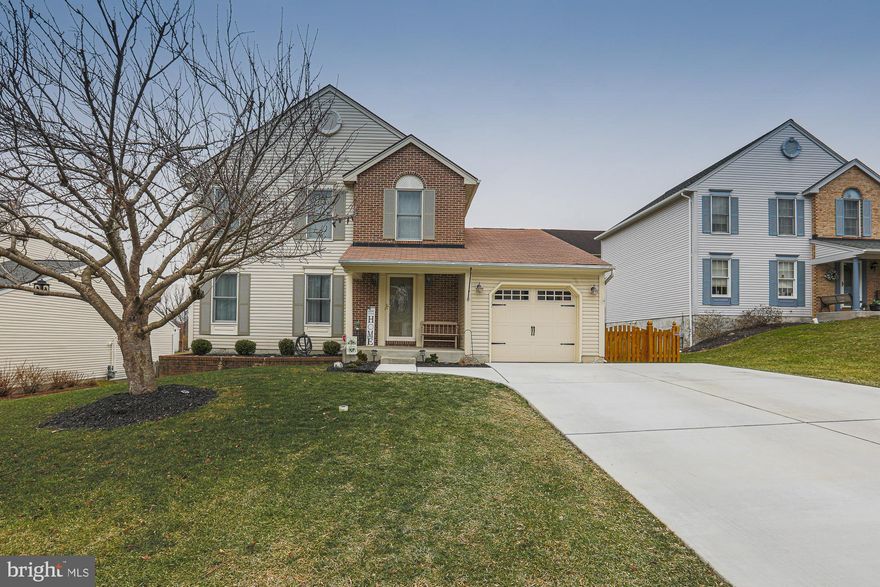 This is the one you have been waiting for. This home has it all. Completely redone first floor featuring new flooring, updated kitchen with stainless steel appliances and a beautiful granite bar and butler's pantry. Fresh paint through the entire house, Upper-level features new carpet with oversized bedrooms with a custom master bath. Relax in your basement that features a walkout to your lovely yard that you can entertain on your newly redone deck. On the exterior of this home the fence and garage door and driveway are brand new so there is no exterior maintenance.  This home is perfect for entertaining or sitting around and enjoying the natural wood burning fireplace on a quite night. Make this home yours today.