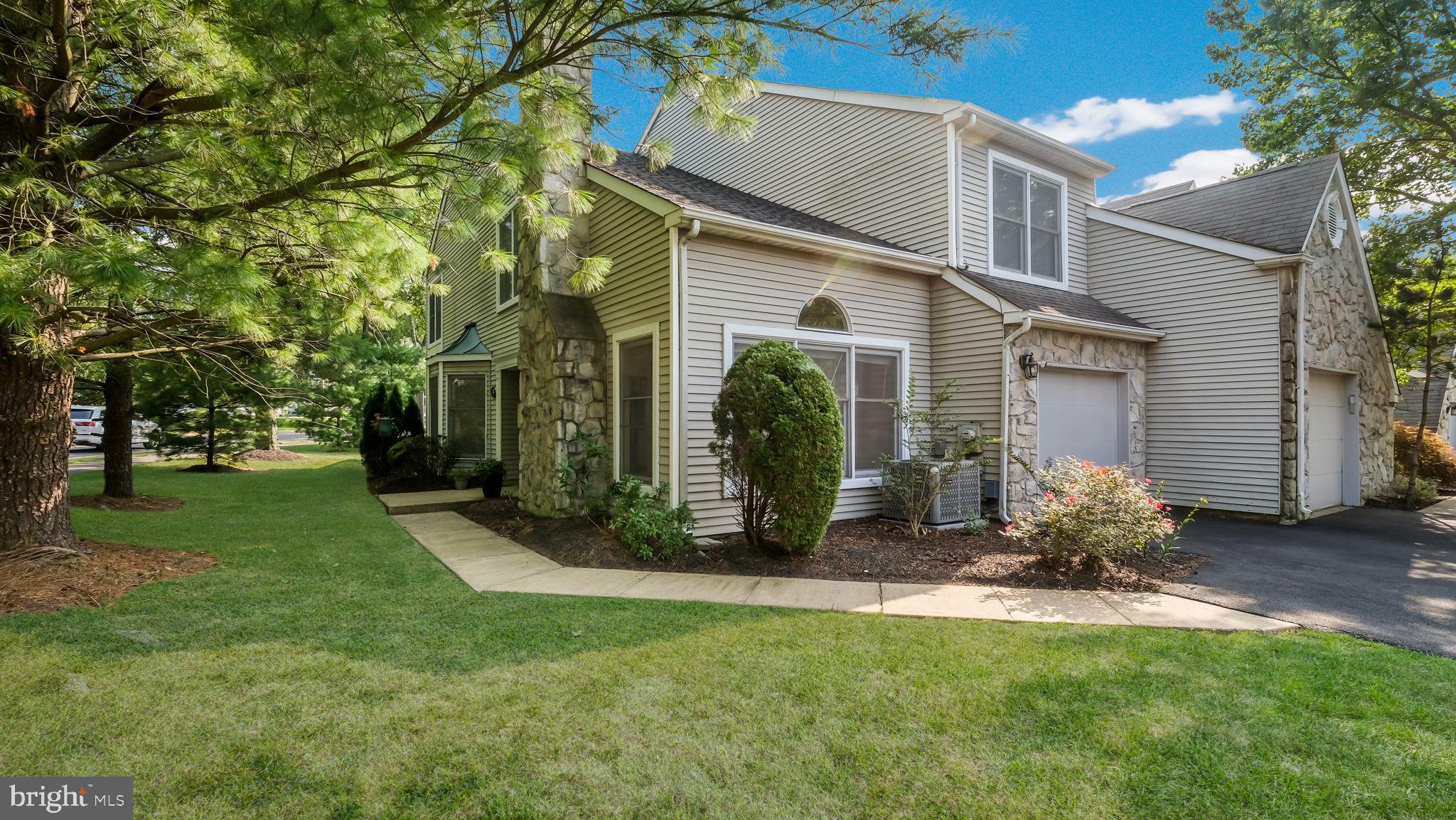 Welcome to this spacious and well maintained end unit townhome in the highly sought after Newtown Gate! The location of this home is ideally situated within the prestigious Council Rock School district and in close proximity to the quaint shops and restaurants of Newtown as well as both Tyler State Park and Core Creek Park.
This end unit has almost 2300 square feet of living space and great light throughout. The first floor features a large kitchen offering plenty of cabinets and counter space, newer stainless steel appliances, and a light and bright eat-in area. The living room features a vaulted ceiling and cozy fireplace and is nicely situated off the entrance offering a separate place to entertain or relax. The combination family room/dining room area is conveniently located off the kitchen with sliding doors leading from the family room to the outdoor patio space where you have some inherent privacy as the end unit. The second floor features a very large primary suite with sitting area, a primary bathroom with tub, separate shower/toilet area, and dual sinks. The primary suite also has not one, but 2 large walk in closets to help keep organized! Two additional well-sized bedrooms, a full bath, and a convenient laundry area complete the 2nd floor. Flooring in the entire home has been replaced with wood and wood laminate, making it easy to keep clean.
Enjoy peace of mind with a newer HVAC system. Additionally, the driveway has been recently replaced and re-sealed. This home has been freshly painted and is ready for its new owners - don't miss out!