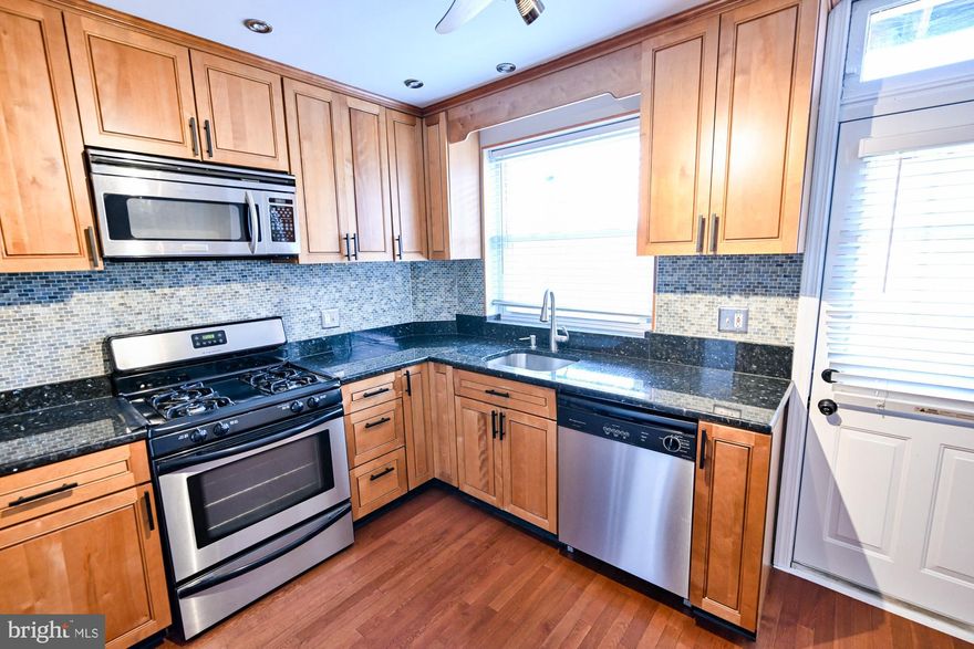 Welcome home to this spacious 3 bedroom, 2 bath, 1 car parking (
SELLER IS IN THE PROCESS OF INSTALLING A 1 CAR PARKING PAD)  Brewer’s Hill home located on a tree lined street with tons of parking.  The open concept living room has hardwood floors, large front window with a  shutter and a brick accent wall.  Off the living room is the gourmet eat-in kitchen with granite countertops, stainless steel appliances and tons of cabinet and counterspace.  Rounding out the main level is a rarely available large coat/storage closet and a full bathroom with a tub/shower combination. Off the kitchen is a walled patio that is perfect for having a cookout with friends and family.  One of the most remarkable aspects of this home is how bright and airy it is between the large windows and the amount of recessed lighting that floods the space.
 
On the second level you will find the two spacious bedrooms and the renovated hall bathroom.  The front bedroom has hardwood floors, 2 ceiling fans, large windows, and a large closet.  The rear bedroom has newly installed wall-to-wall carpet, ceiling fan, and access to a rear balcony overlooking the rear patio.  The hall bathroom has a tub/shower combination with tile surround.
 
The large finished basement with tile flooring and recessed lighting could be used as a 3rd bedroom (legal rentable bedroom because of the rear door in basement), additional recreation area, or office – the options are endless.  The rear unfinished part of the basement has room for tons of storage and this is where you will also find the laundry, water heater, and HVAC.  At the rear of the basement is egress to the rear patio. This will make bringing in furniture, bicycles, etc. to the basement a snap!
 
This home is convenient to I95, bars, restaurants, Canton Crossing and the Merritt Athletic Club.

No smoking in the home